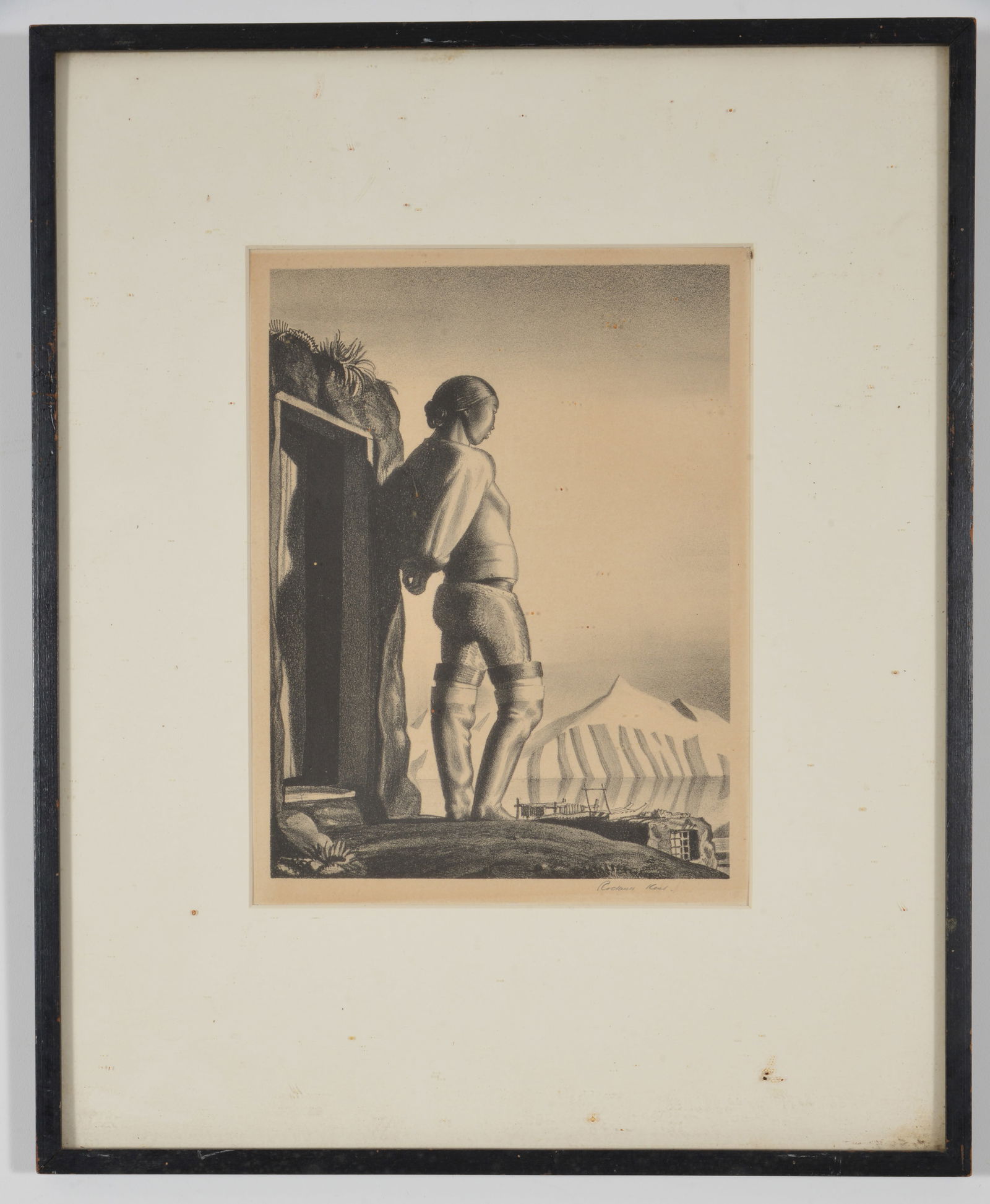 Rockwell Kent. "Young Greenland Woman". Lithograph on paper depicting a native Greenlander woman in: Rockwell Kent. "Young Greenland Woman". Lithograph on paper depicting a native Greenlander woman in high boots outside a dwelling. Pencil signed lower right margin. Framed under glass. Toning. Sight: