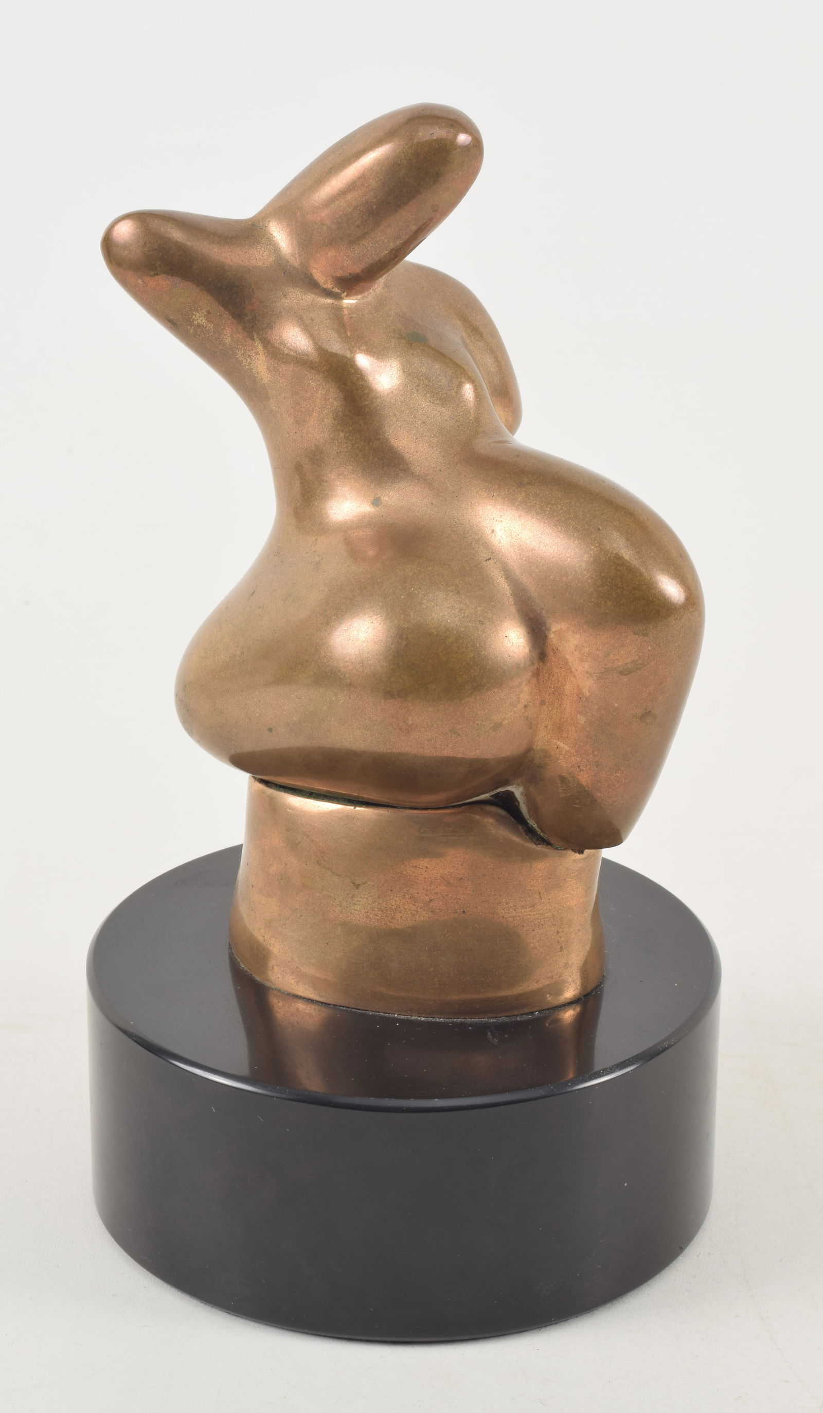 Mid century abstract bronze nude sculpture in style of Jean Arp. Seated figure of a woman on black: Mid century abstract bronze nude sculpture in style of Jean Arp. Seated figure of a woman on black stone base. Signed L.S. #10. 8.5in high.