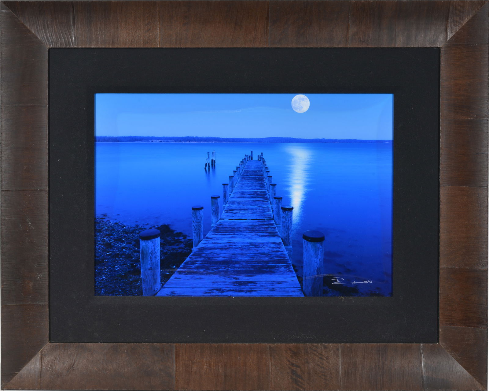 Peter Lik, Austrailian-American Contemporary. Limited edition photographic print 133/950. "A Moon: Peter Lik, Austrailian-American Contemporary. Limited edition photographic print 133/950. "A Moon Over Montauk" Hand signed and editioned by the artist lower right and on reverse. Includes Letter of A