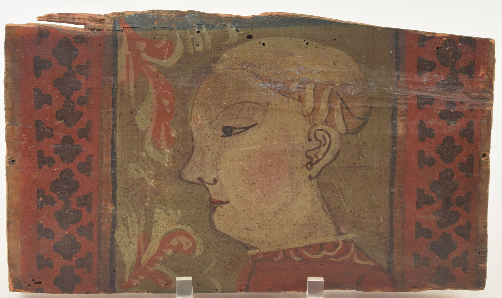 Early fresco style painting of a religious figure, 17th century or earlier. Figure depicted in: Early fresco style painting of a religious figure, 17th century or earlier. Figure depicted in profile, possibly wearing a monk's habit and tonsure haircut. Patterned red and black geometric borders.