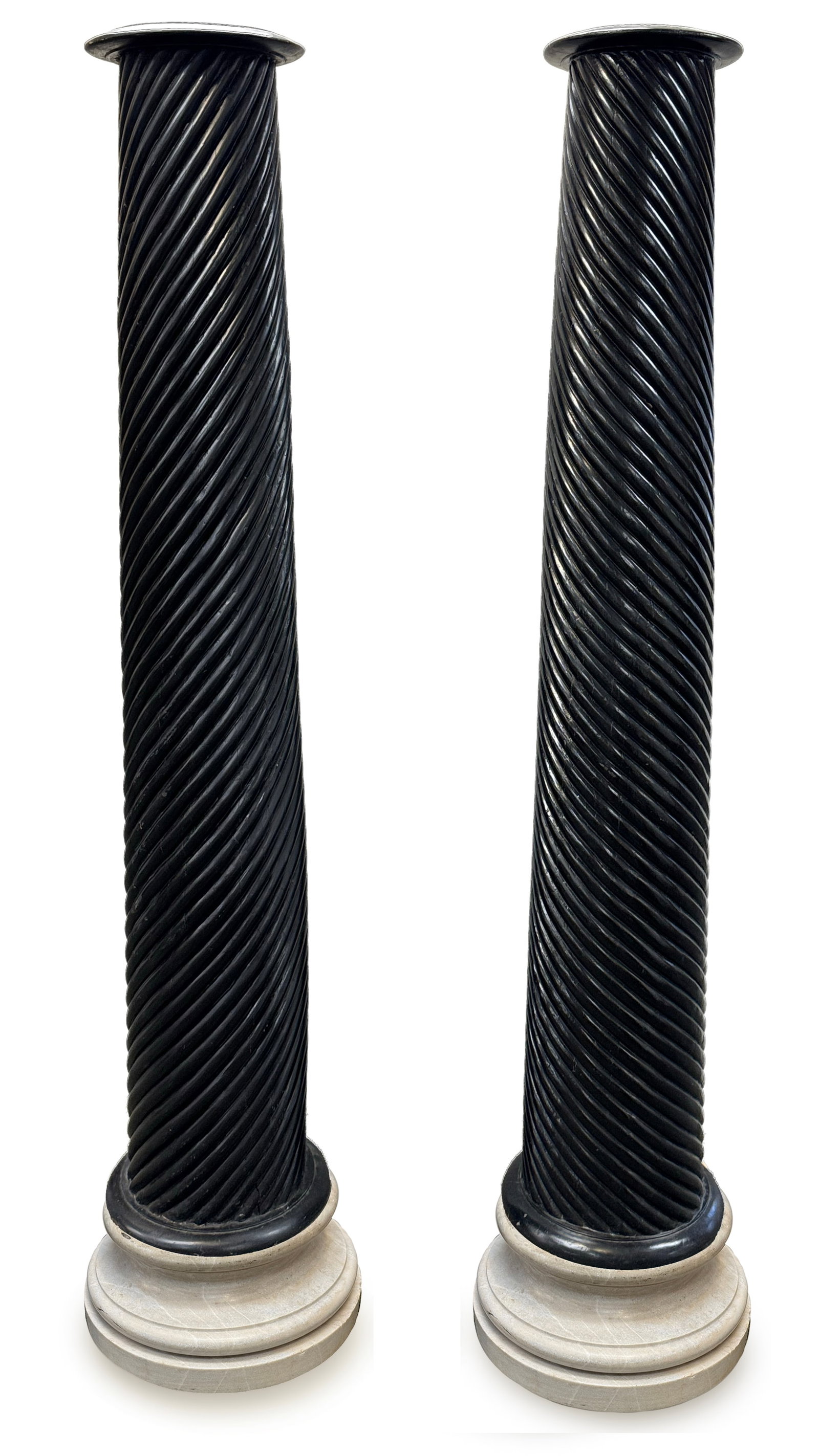 Early 19th century Anglo-Indian ebony wood columns on marble plinths. Carved spiraling design. Very: Early 19th century Anglo-Indian ebony wood columns on marble plinths. Carved spiraling design. Very heavy. Heights of columns off stands: 71.5in and 72.5in.