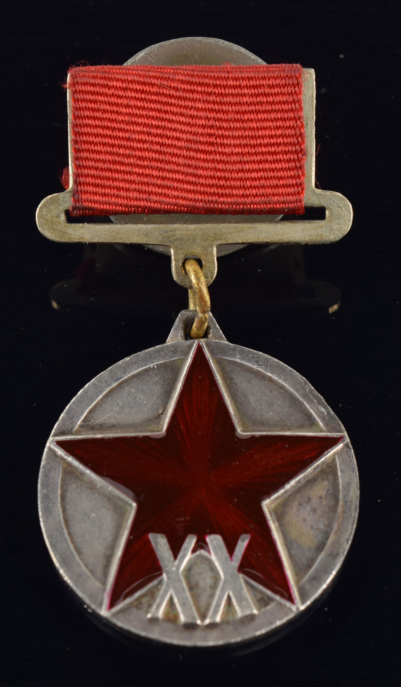 WWII Russian/Soviet Medal "XX Years of RKKA" Type 1. USSR, 1938-1943. Screw back suspension. This: WWII Russian/Soviet Medal "XX Years of RKKA" Type 1. USSR, 1938-1943. Screw back suspension. This medal was not numbered on the medal itself. The serial number was applied only to the screw plate. The