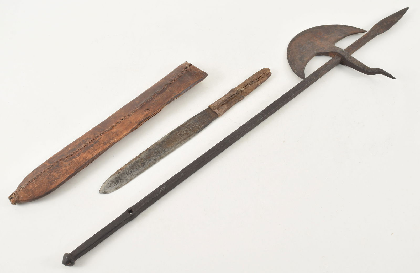 Massai hand wrought dagger together with Indo-Persian engraved and decorated battle axe, 19th: Massai hand wrought dagger together with Indo-Persian engraved and decorated battle axe, 19th century. Axe: 28.5in length. Provenance: From a Belmont estate.