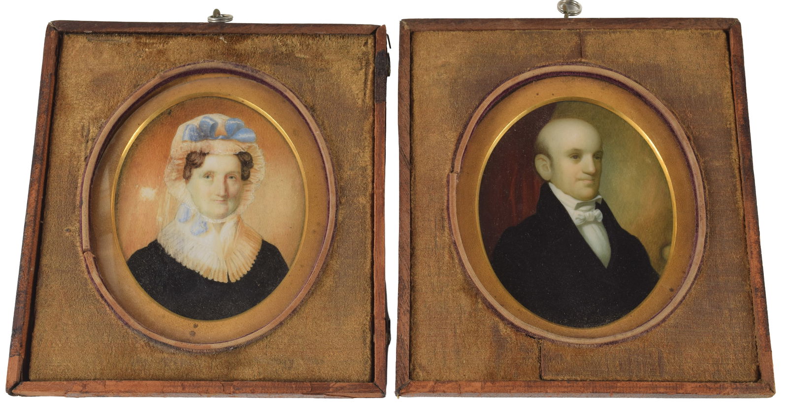 Pair of 19th century miniature portraits mounted in a leather case. Portraits of a man and woman. (1 of 4)