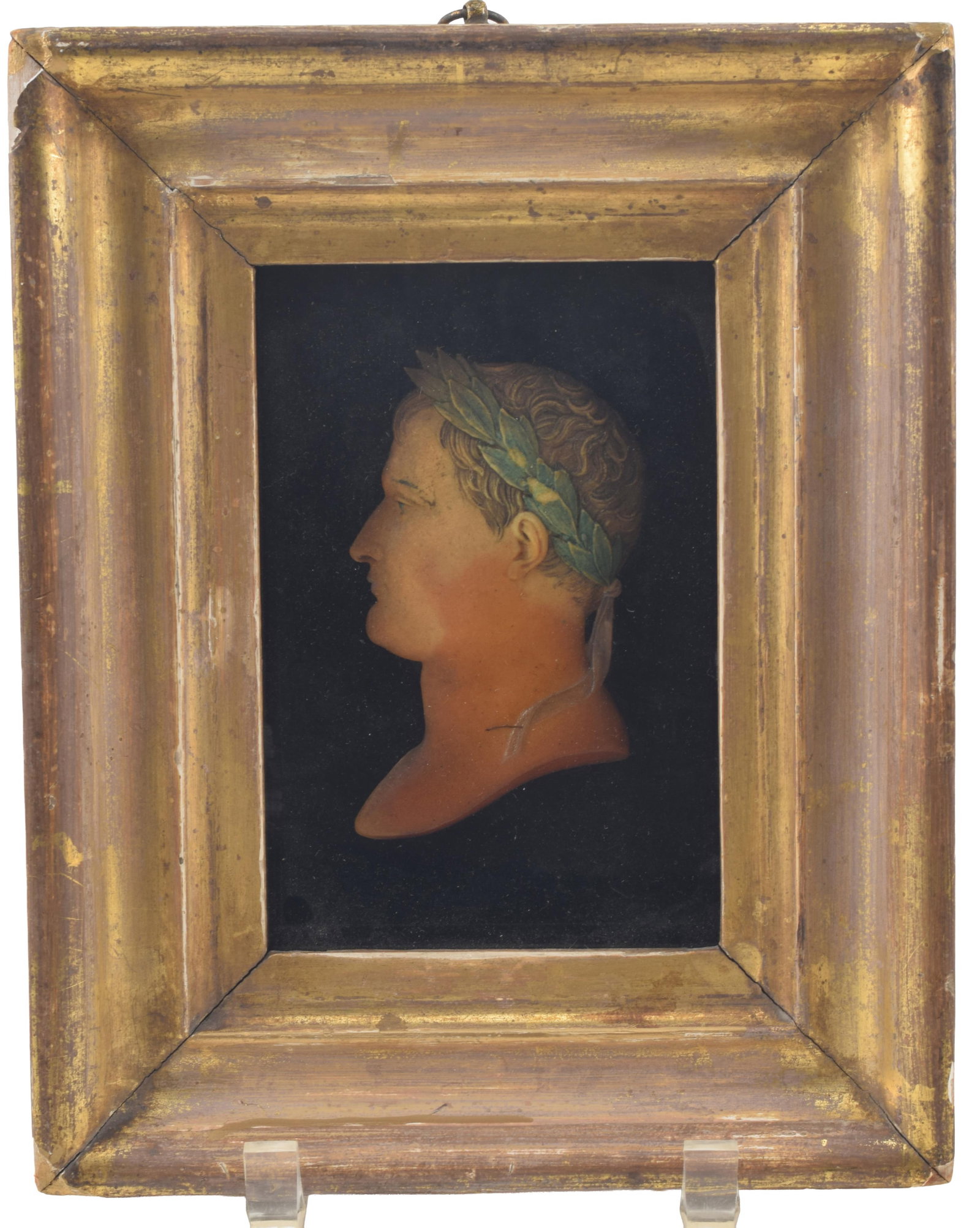 19th century wax bust of Napoleon. Depicted in profile as emperor with laurel wreath with polychrome: 19th century wax bust of Napoleon. Depicted in profile as emperor with laurel wreath with polychrome decoration. Framed under glass. Overall: 10 x 8in.