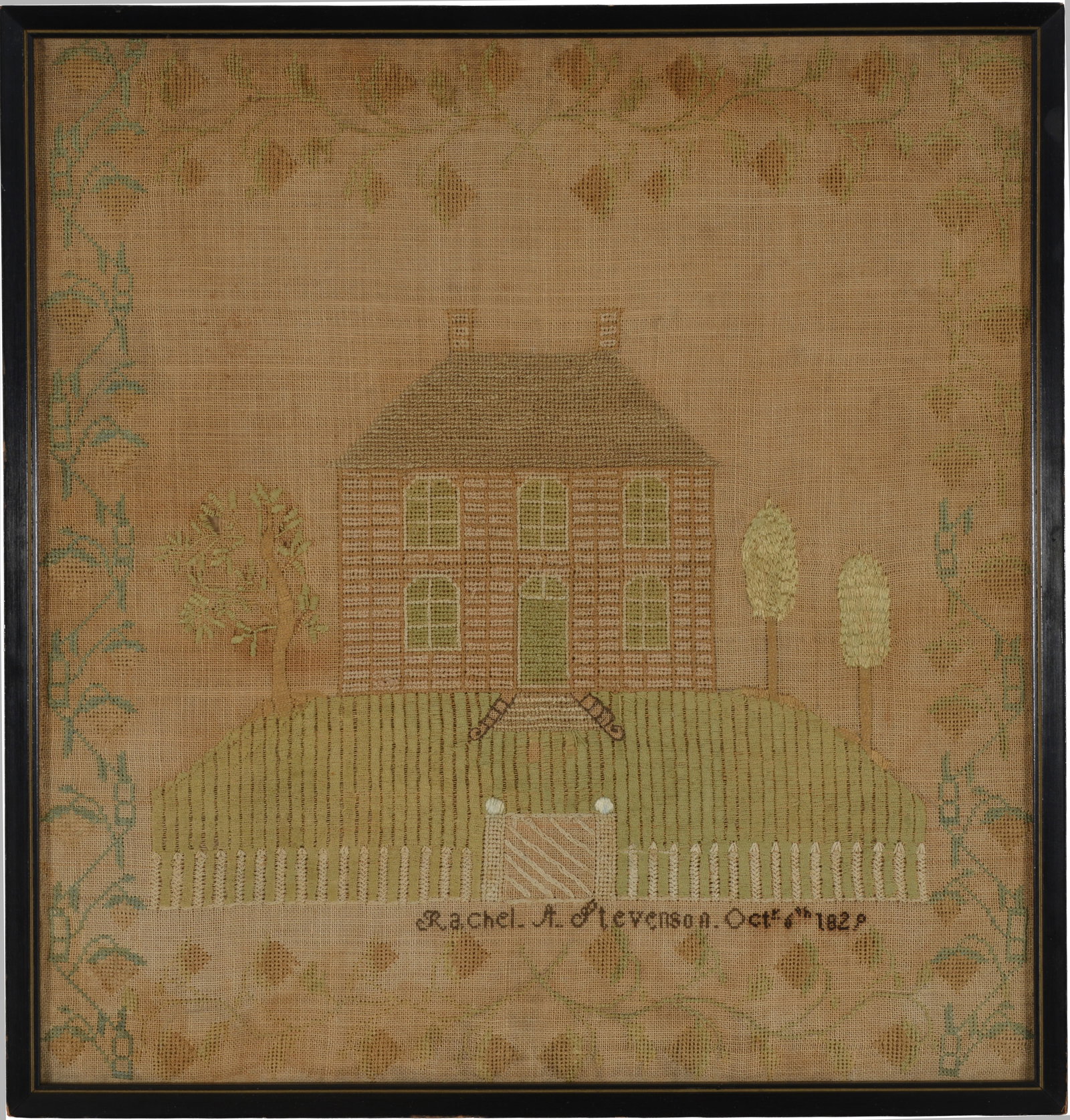 1829 Rachel A. Stevenson sampler depicting a large house with tree-lined lawn and white picket: 1829 Rachel A. Stevenson sampler depicting a large house with tree-lined lawn and white picket fence. Strawberry vine border. Dated October 6th 1829. Fading. Framed under glass. Overall: 18 x 17in.