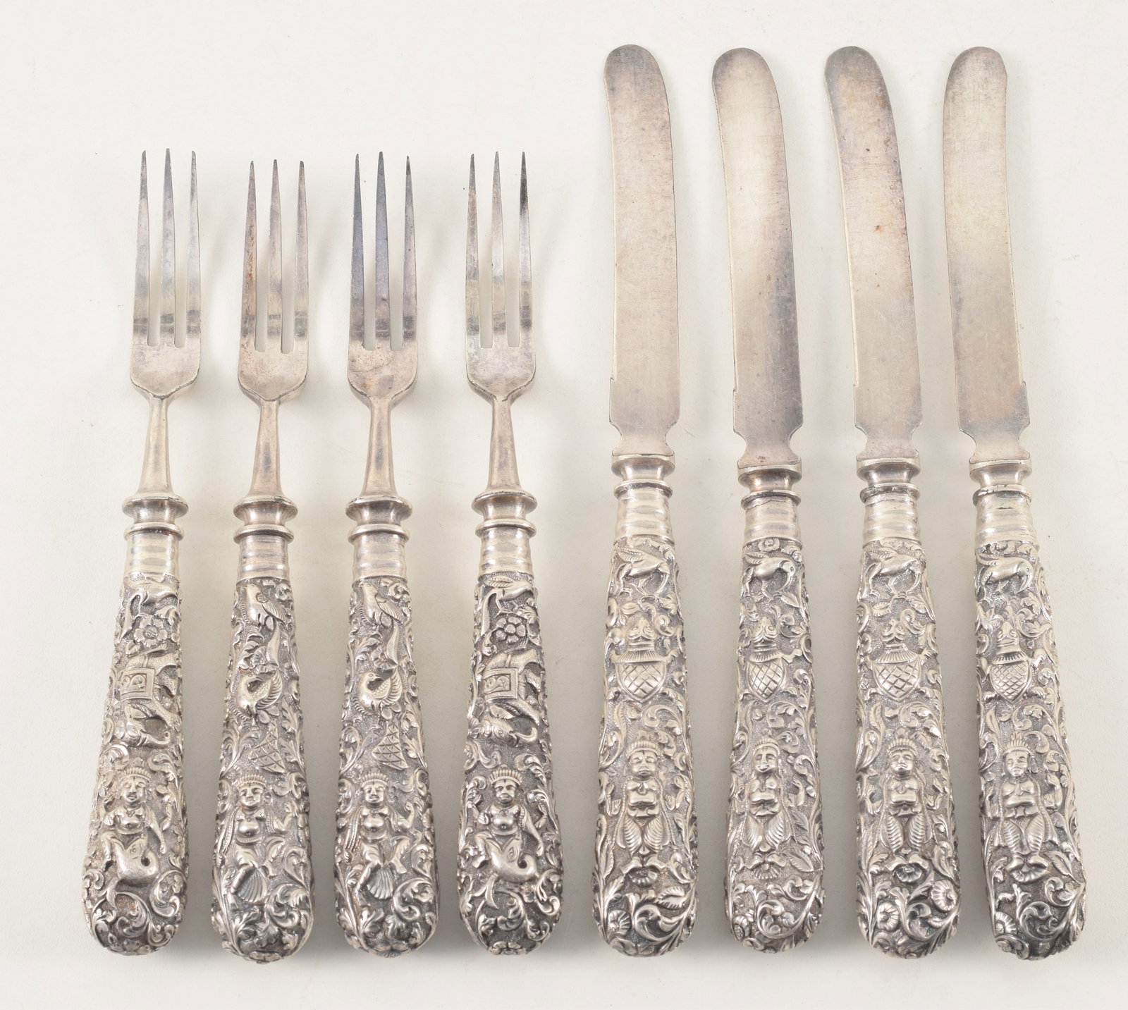 Set of 4 Anglo-Indian silver luncheon knives and forks with finely decorated figural and floral (1 of 5)