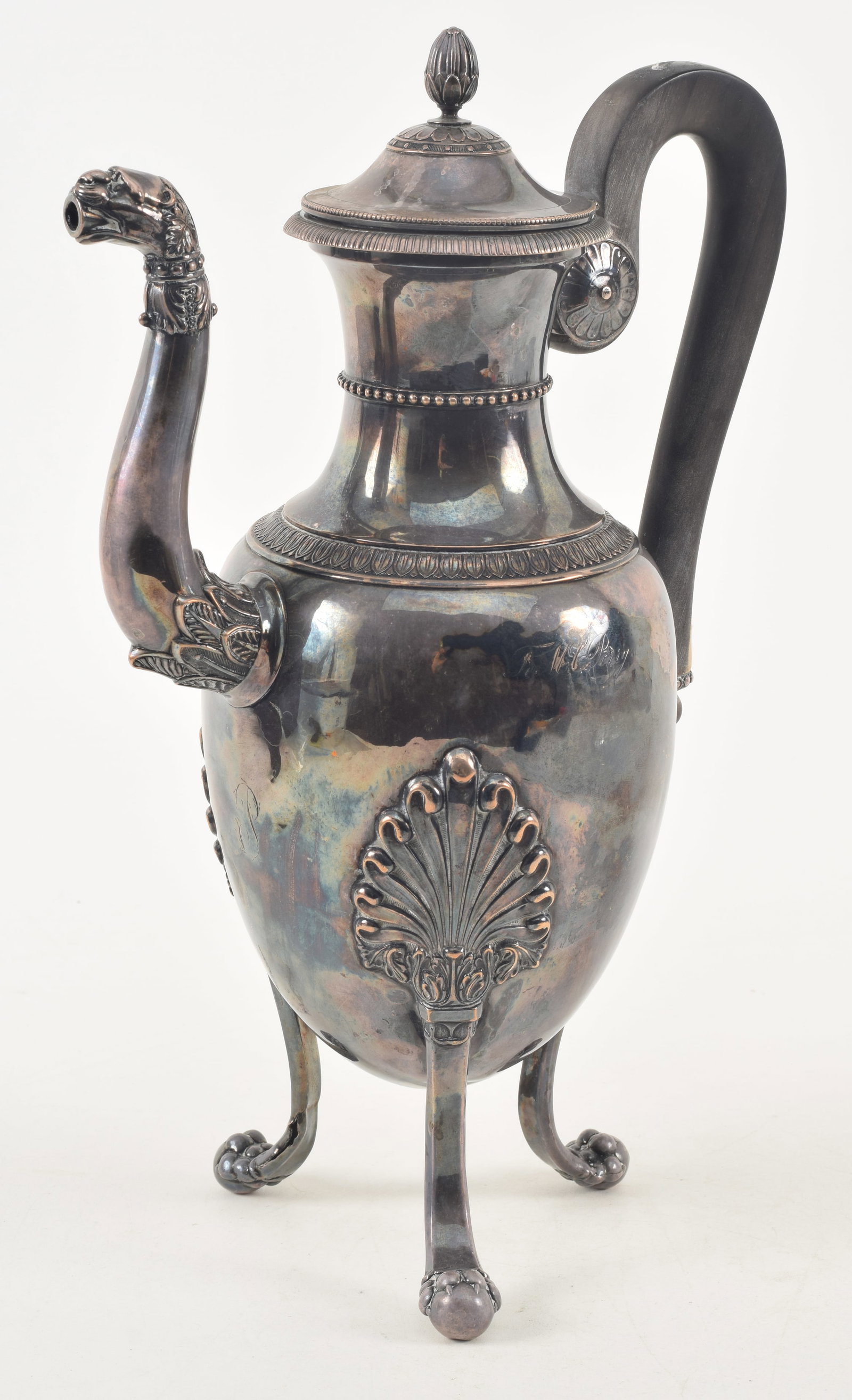 19th century silver footed ewer. Lion head spout, bead and lead borders, tri-pod lion's paw feet.: 19th century silver footed ewer. Lion head spout, bead and lead borders, tri-pod lion's paw feet. Partial silver hallmarks on interior rim of lid. Some damage to feet. Dent to interior lid. Several de
