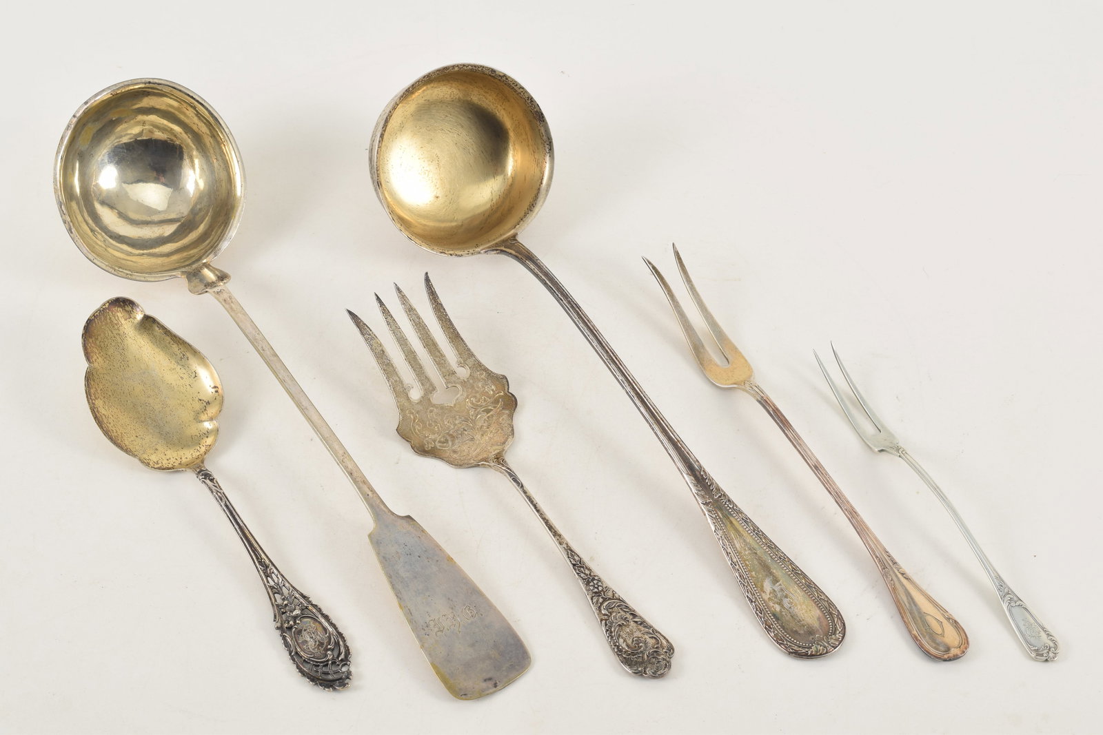 6 Silver serving items marked 800, 2 ladles, 3 forks and a pierced handle spoon. 21.7 ozt. (1 of 10)