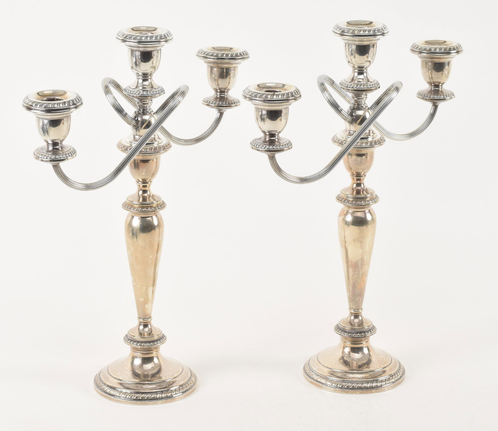 Pair of Poole weighted sterling silver convertible three arm candelabra. Height 15 1/4 in. (1 of 4)
