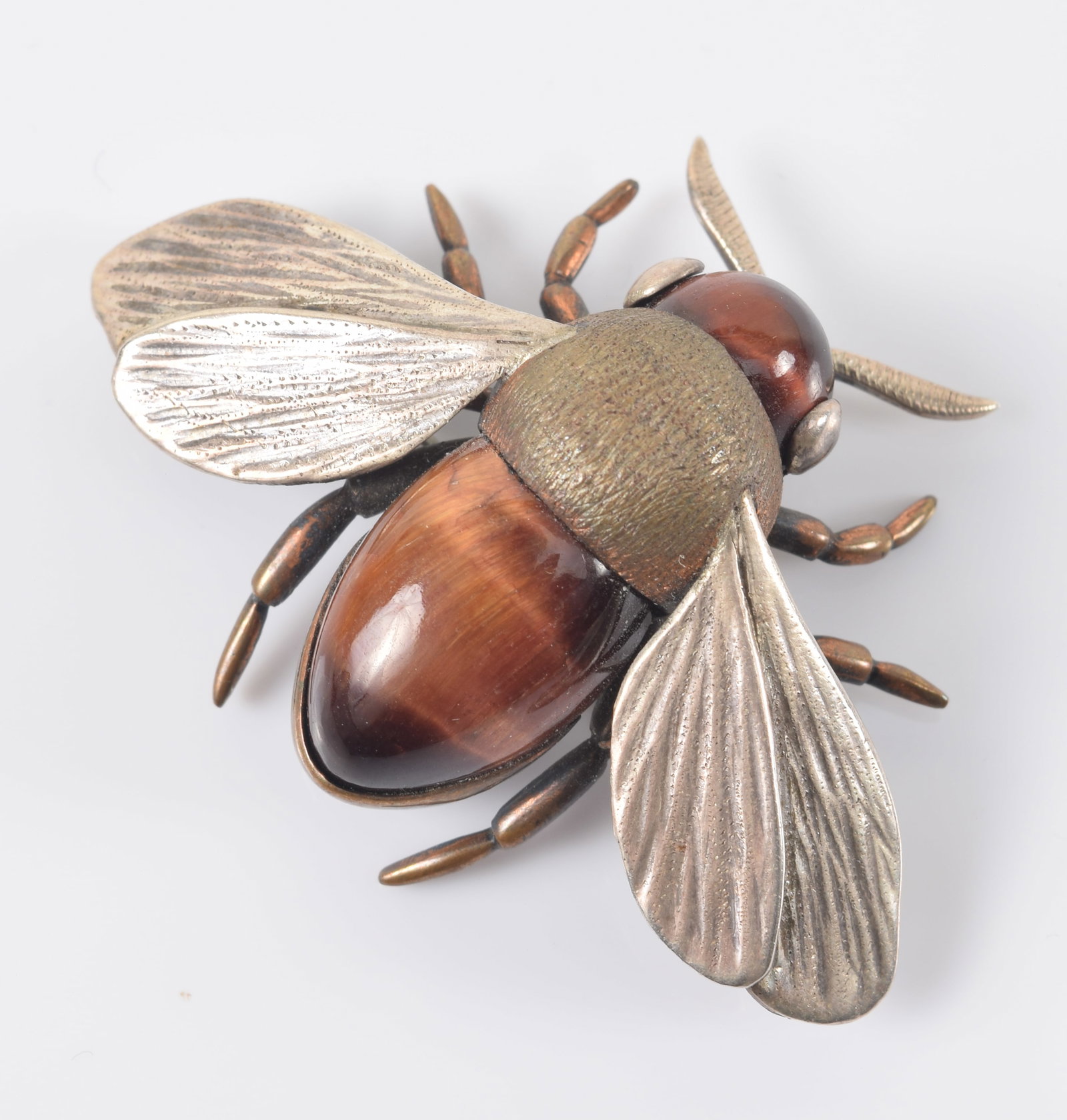 Clifford Russell. Maine. Fine quality sterling silver and tiger's eye mounted bumble bee pin. Marked (1 of 3)