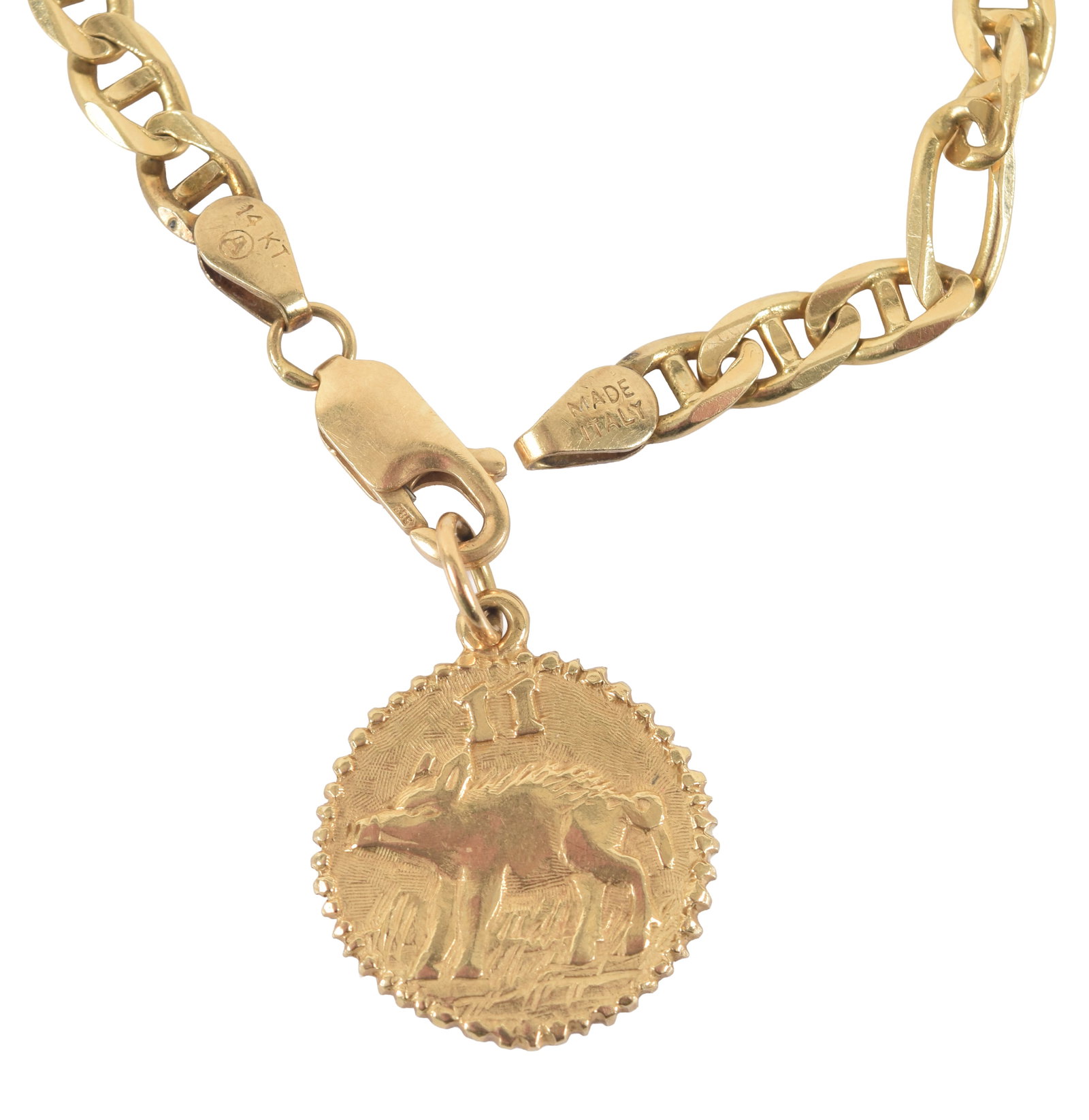 14K gold coin charm bracelet. Ancient style coin pendant with boar on one shide, and masted ship on: 14K gold coin charm bracelet. Ancient style coin pendant with boar on one shide, and masted ship on the other. Hallmarked. Chain marked 14K. Coin: 0.75in diameter. Chain length: 8in. 10.6 grams.