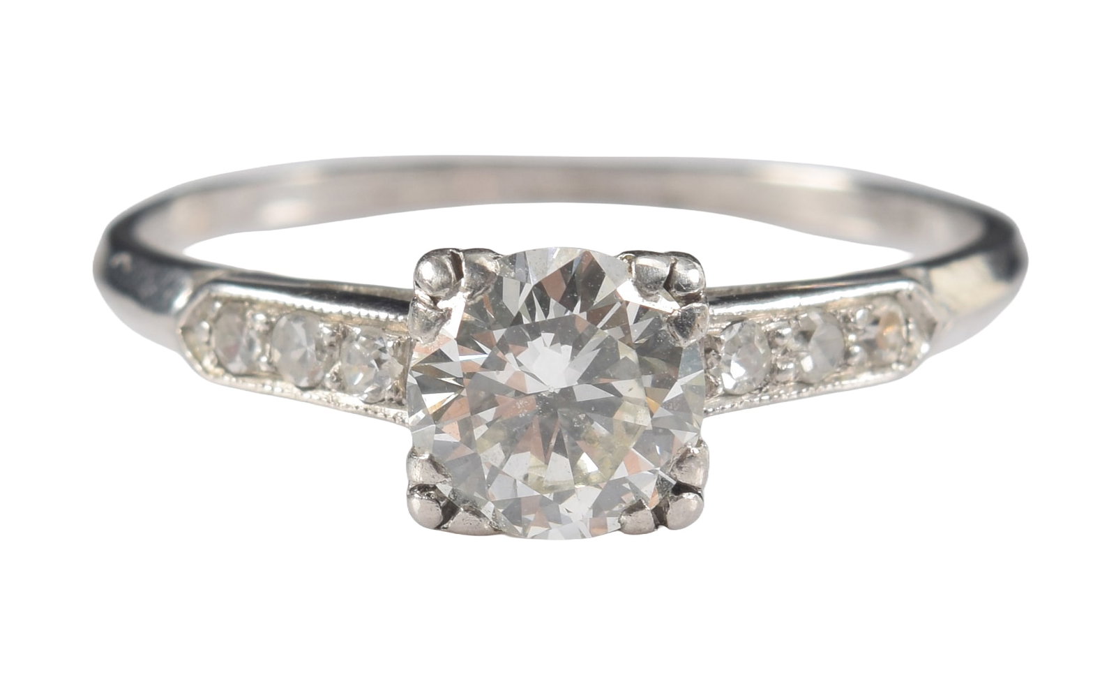 Vintage platinum diamond solitaire ring. Diamond approx. 5.9mm diameter (0.80cts). Flanked by two (1 of 5)