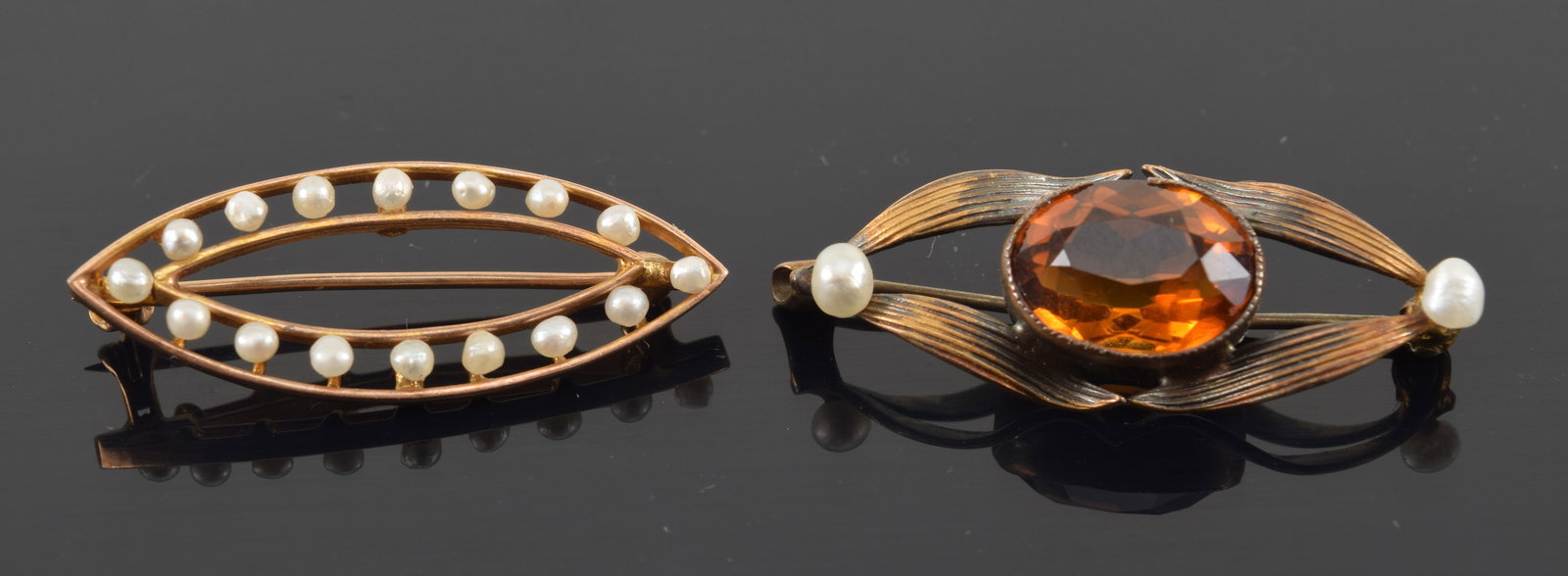 2 gold pins. 1) 10K gold openwork seed pearl pin. Marked 10K. 1.7 grams. 2) Orange stone and pearl (1 of 3)