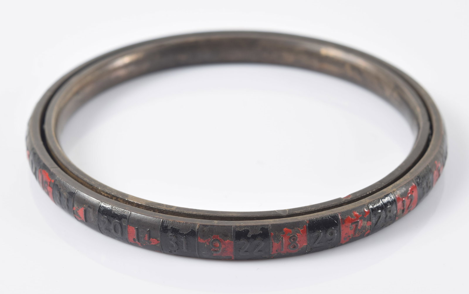 Unusual sterling silver roulette wheel bangle bracelet, early 20th century. Ball bearings provide: Unusual sterling silver roulette wheel bangle bracelet, early 20th century. Ball bearings provide free movement to the outer half of the bracelet and rattle to give the impression of a live roulette w