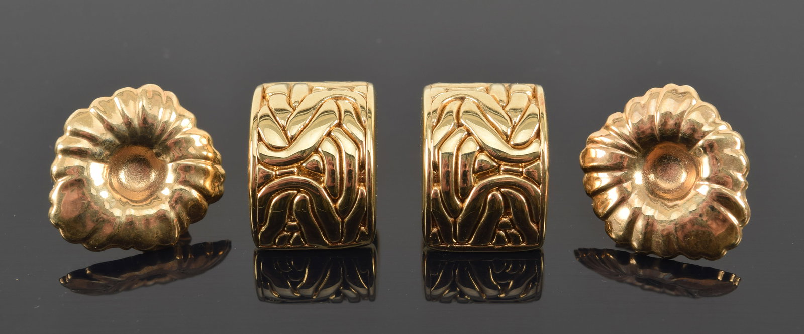 2 pairs of 14K gold earrings. 1) Demi lune form with abstract knot design. 2) Floral form. Largest: (1 of 6)