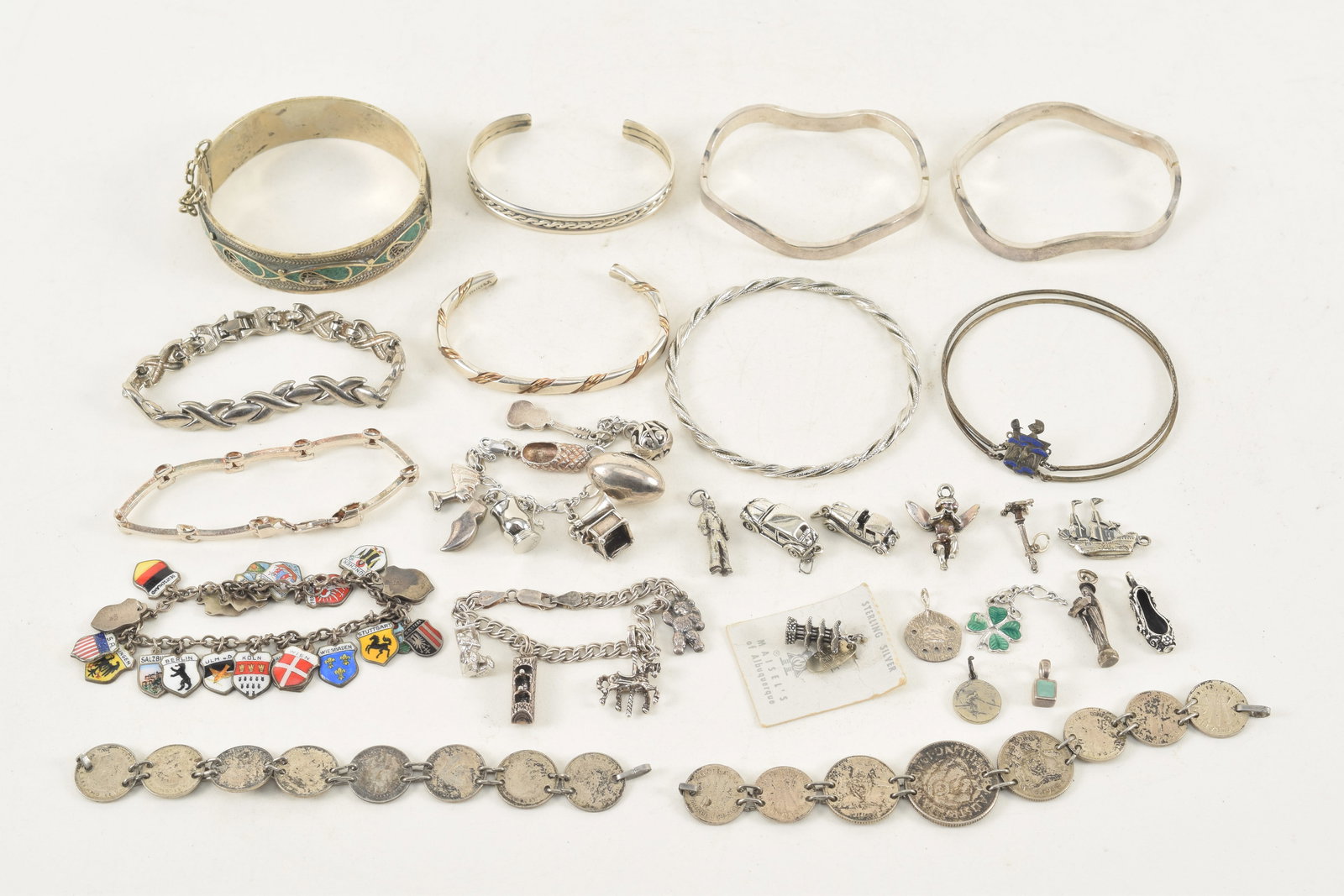 Assorted silver jewelry pieces and accessories. To include: 1) 2 1940s Australian silver coin (1 of 7)