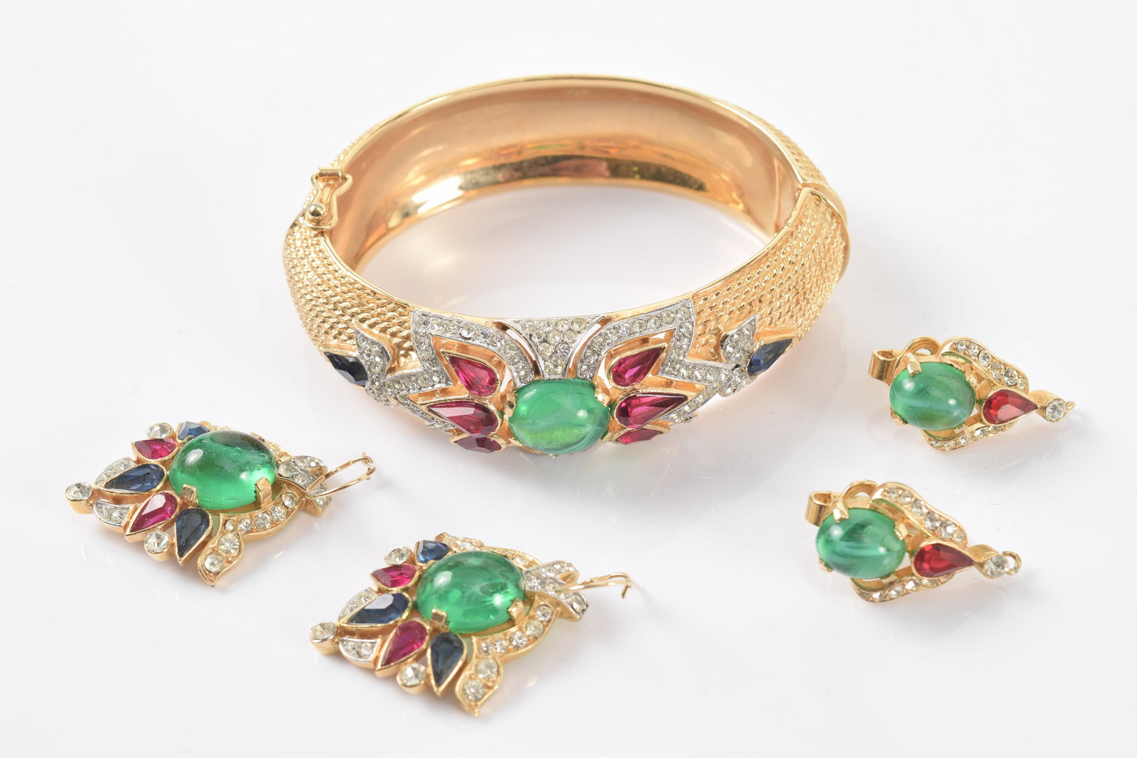 Vintage Trifari "Jewels of India" fashion jewelry set. To include: hinged cuff bracelet, pair of (1 of 8)