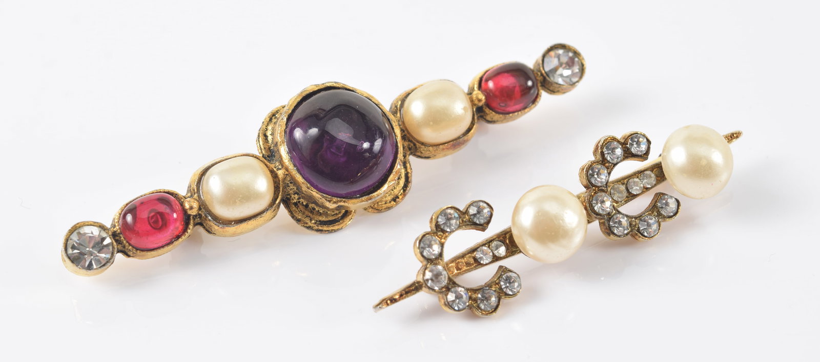 2 vintage Chanel pins. 1) 1985 Chanel gripoix bar pin with faux pearls. Marked on reverse. 3in wide. (1 of 5)