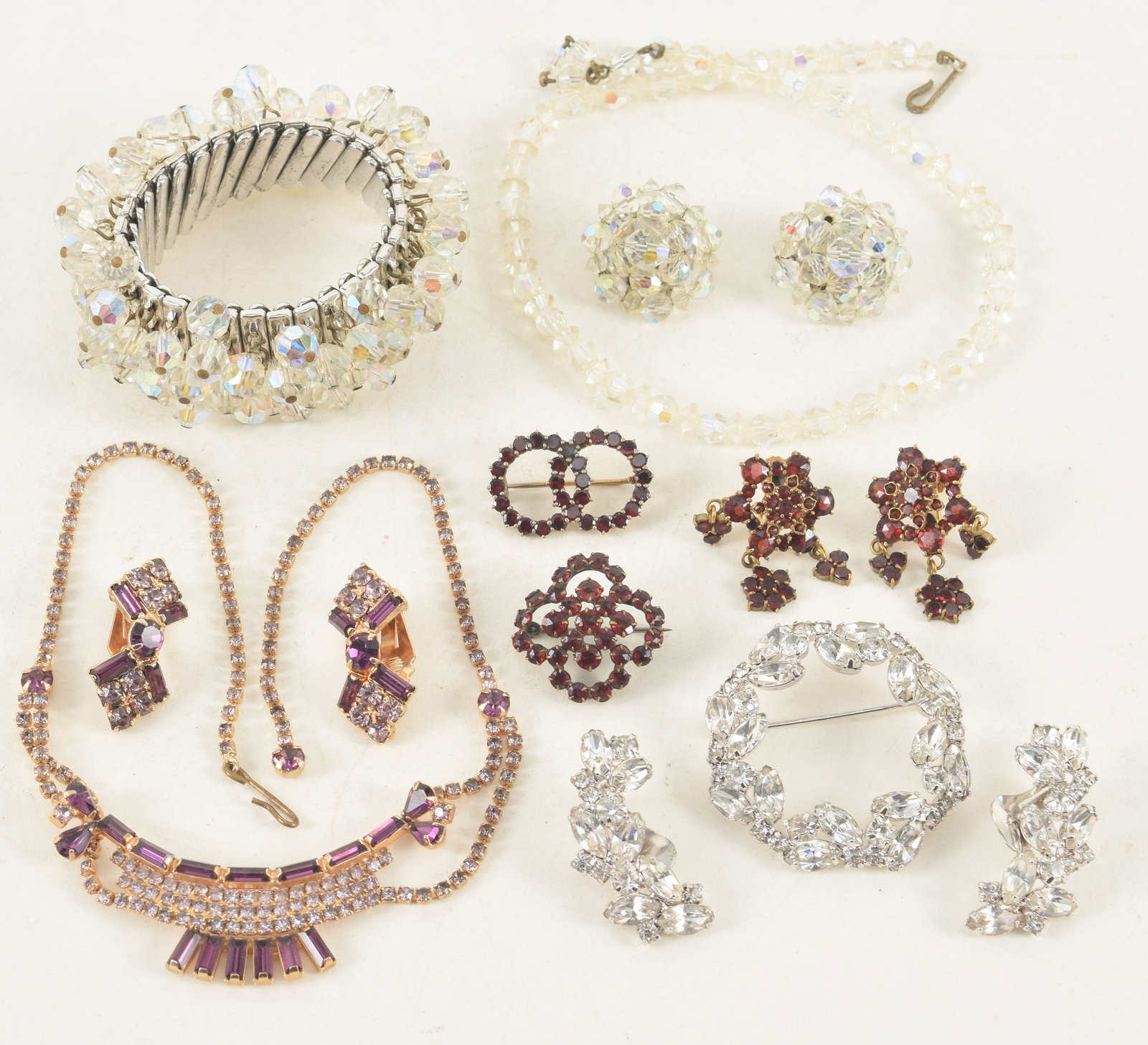 Selection of vintage rhinestone and stone fashion jewelry. (1 of 8)
