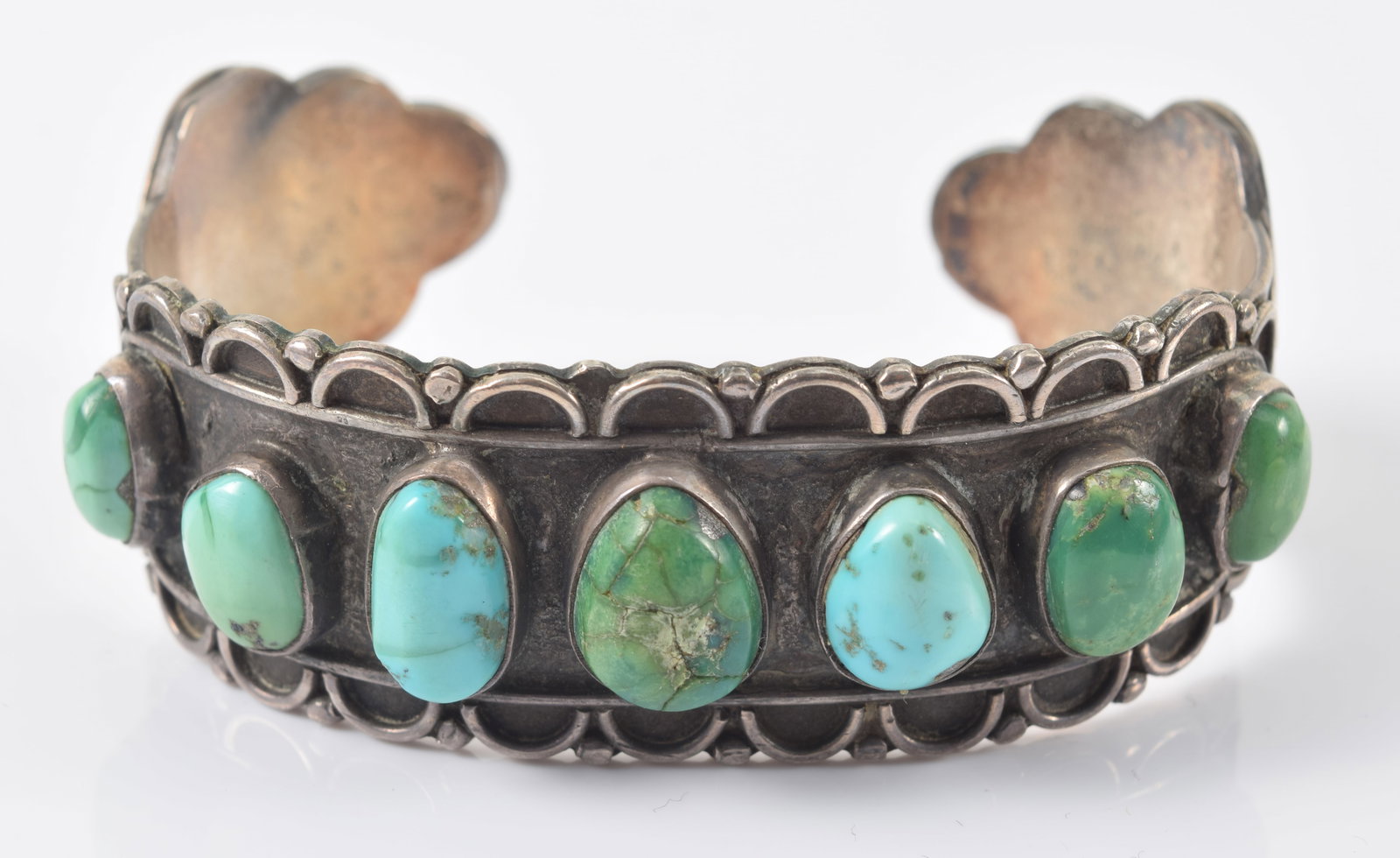 Southwest Native American silver turquoise mounted cuff bracelet. Relief geometric design with green (1 of 5)