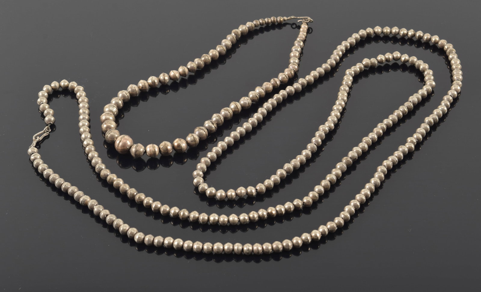 2 southwest silver beaded necklaces. 1) Opera length. 52in length. 2) Graduated necklace. 16in (1 of 5)