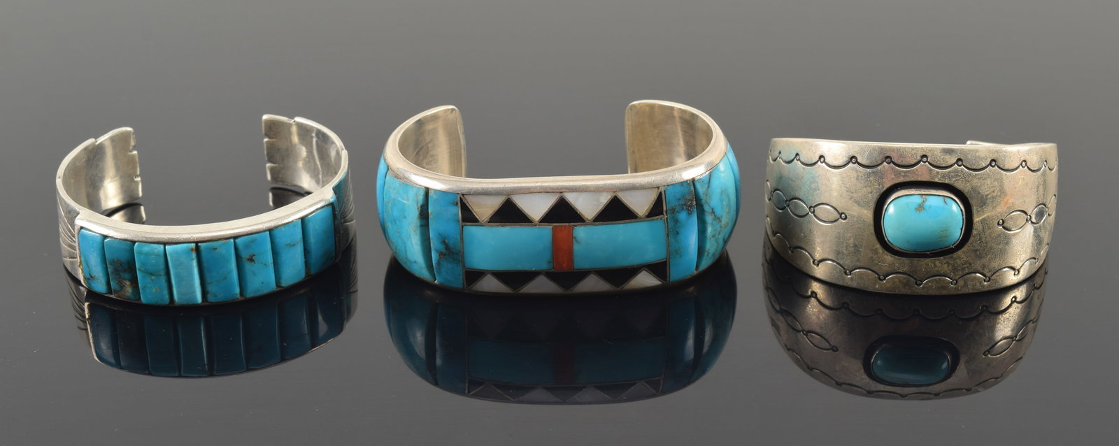 3 Southwest Native American silver and turquoise mounted cuff bracelets. 1) Largest bracelet inlaid (1 of 10)