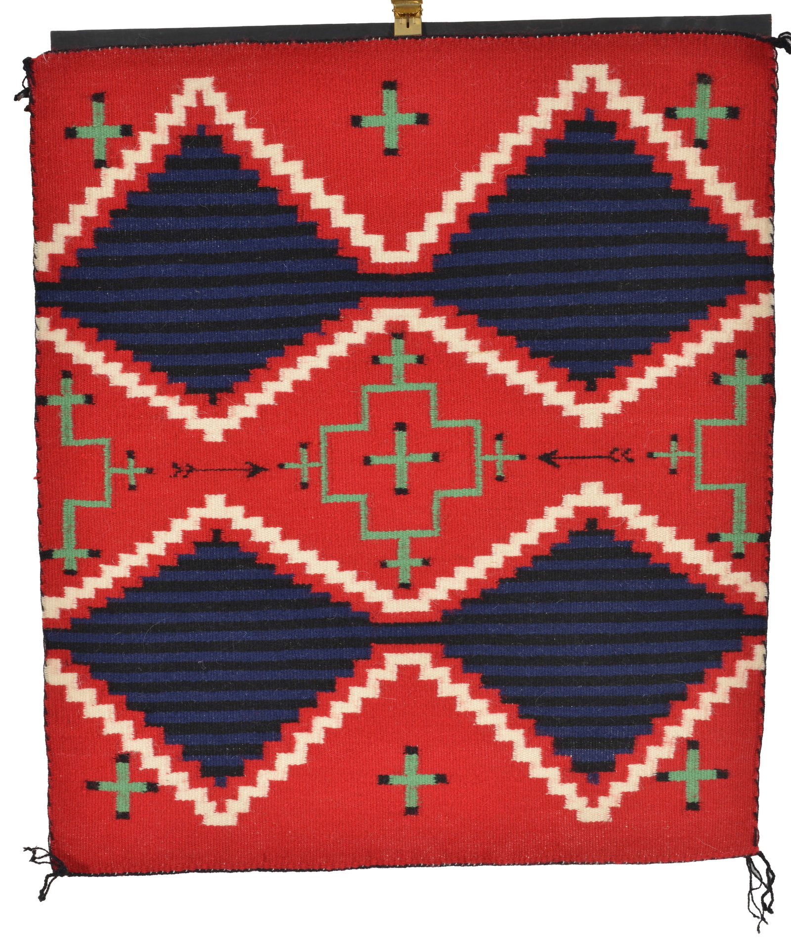 20th century Navajo saddle blanket from the Hubbell trading post in Arizona. Certificate stating: 20th century Navajo saddle blanket from the Hubbell trading post in Arizona. Certificate stating maker: "Colina Yazzie, Pine Haven New Mexico". Velcroed to wall attachment. 21 x 24in.