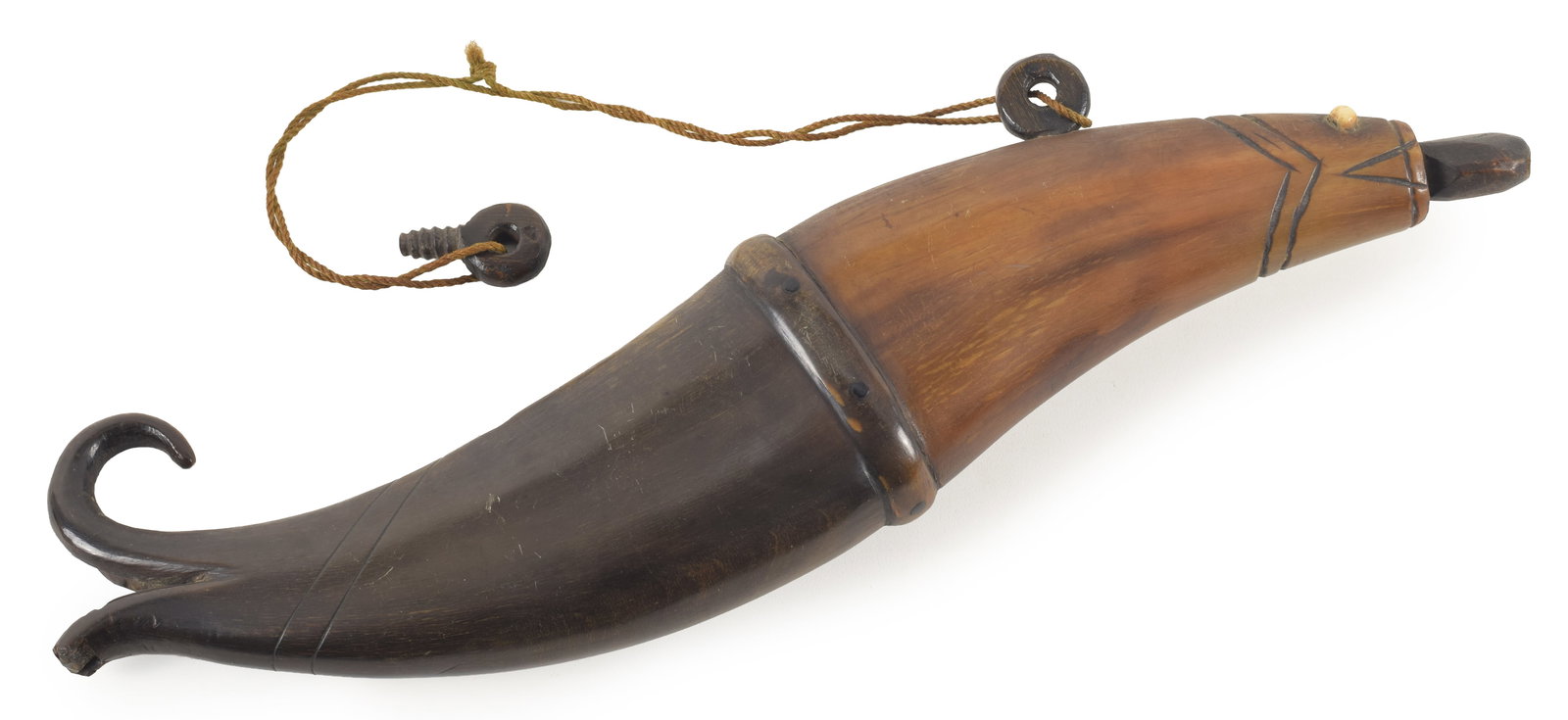 19th century sailor carved powder horn in the form of a stylized fish. Inset eyes. Jointed at the: 19th century sailor carved powder horn in the form of a stylized fish. Inset eyes. Jointed at the middle. Flayed tale with old losses. 11.5in length. Provenance: From the Rex Stark collection of Gardn