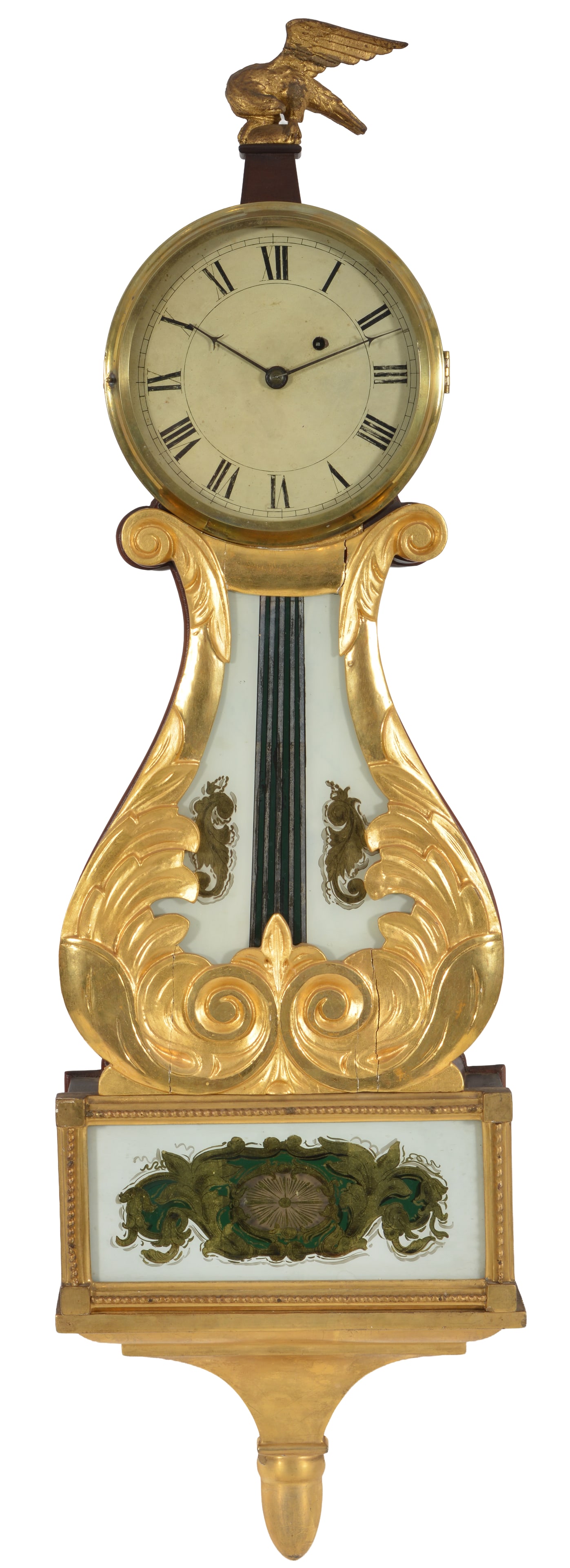 Boston gilt box form lyre clock, attributed to Sawin and Dyer. The full bodied carved eagle finial: Boston gilt box form lyre clock, attributed to Sawin and Dyer. The full bodied carved eagle finial with swept back head above a dial with Roman numerals. The gilded carved foliate frames with original
