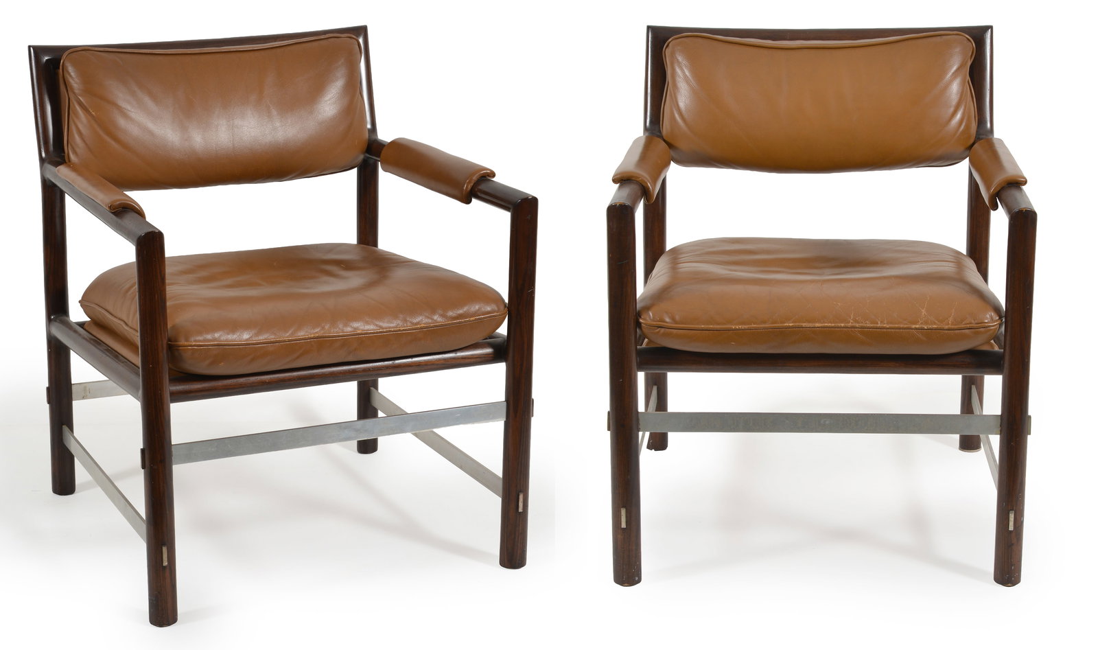 Pair of Edward Wormley chairs for Dunbar furniture. Rosewood frames with aluminum stretchers and: Pair of Edward Wormley chairs for Dunbar furniture. Rosewood frames with aluminum stretchers and original leather upholstery. Good condition.