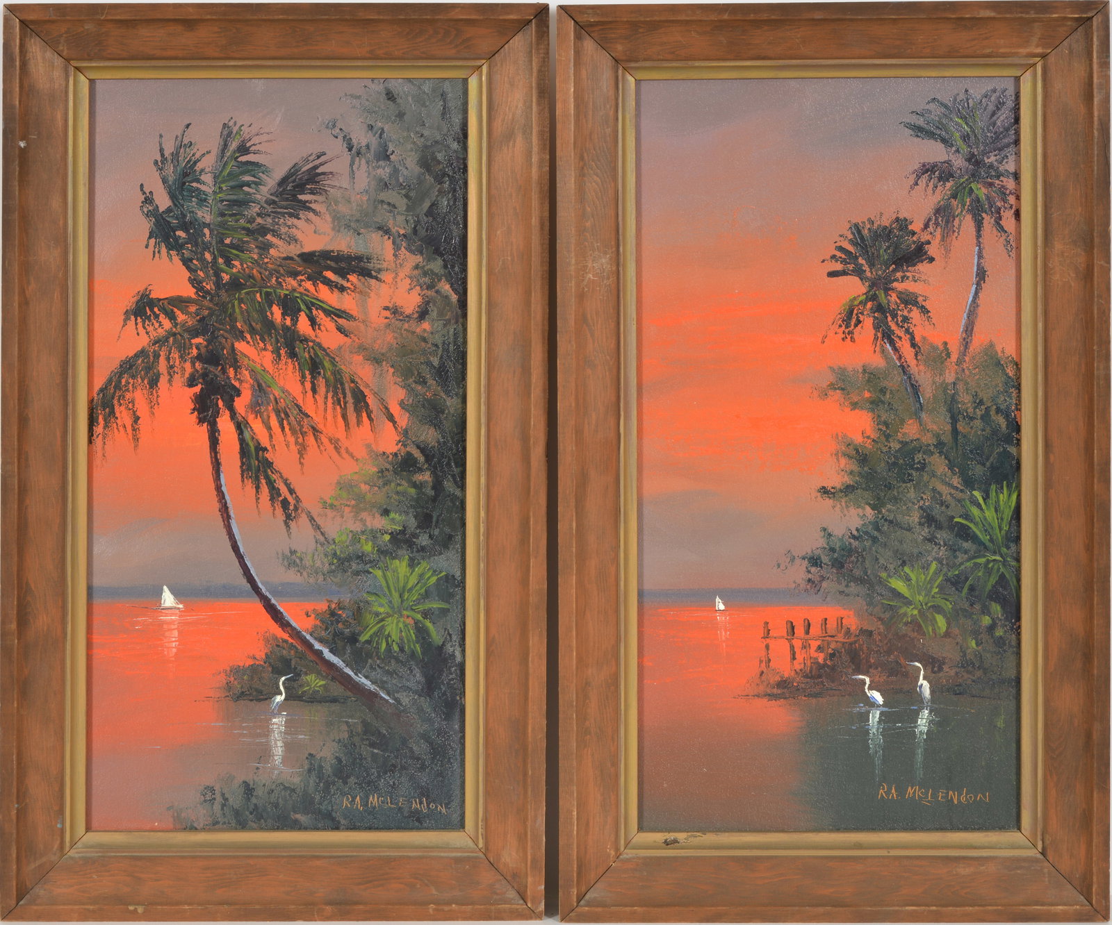 Roy McLendon. Florida Highwaymen. Pair of Florida sunset landscapes with palm trees, sailboat and: Roy McLendon. Florida Highwaymen. Pair of Florida sunset landscapes with palm trees, sailboat and egret. Oil on board. Framed. Signed lower right. Sight: 24 x 12in. Overall: 28 x 16in.
