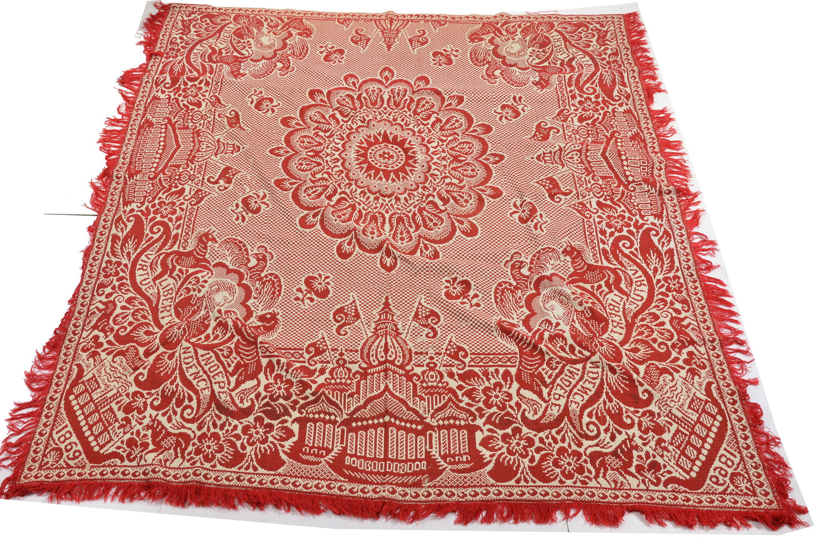 Jacquard coverlet with four military portraits of Ulysses S. Grant, dated 1869. Includes ship with: Jacquard coverlet with four military portraits of Ulysses S. Grant, dated 1869. Includes ship with American flag and motto "Liberty, Virtue, Independence". Red and cream. Good condition with 2 small h