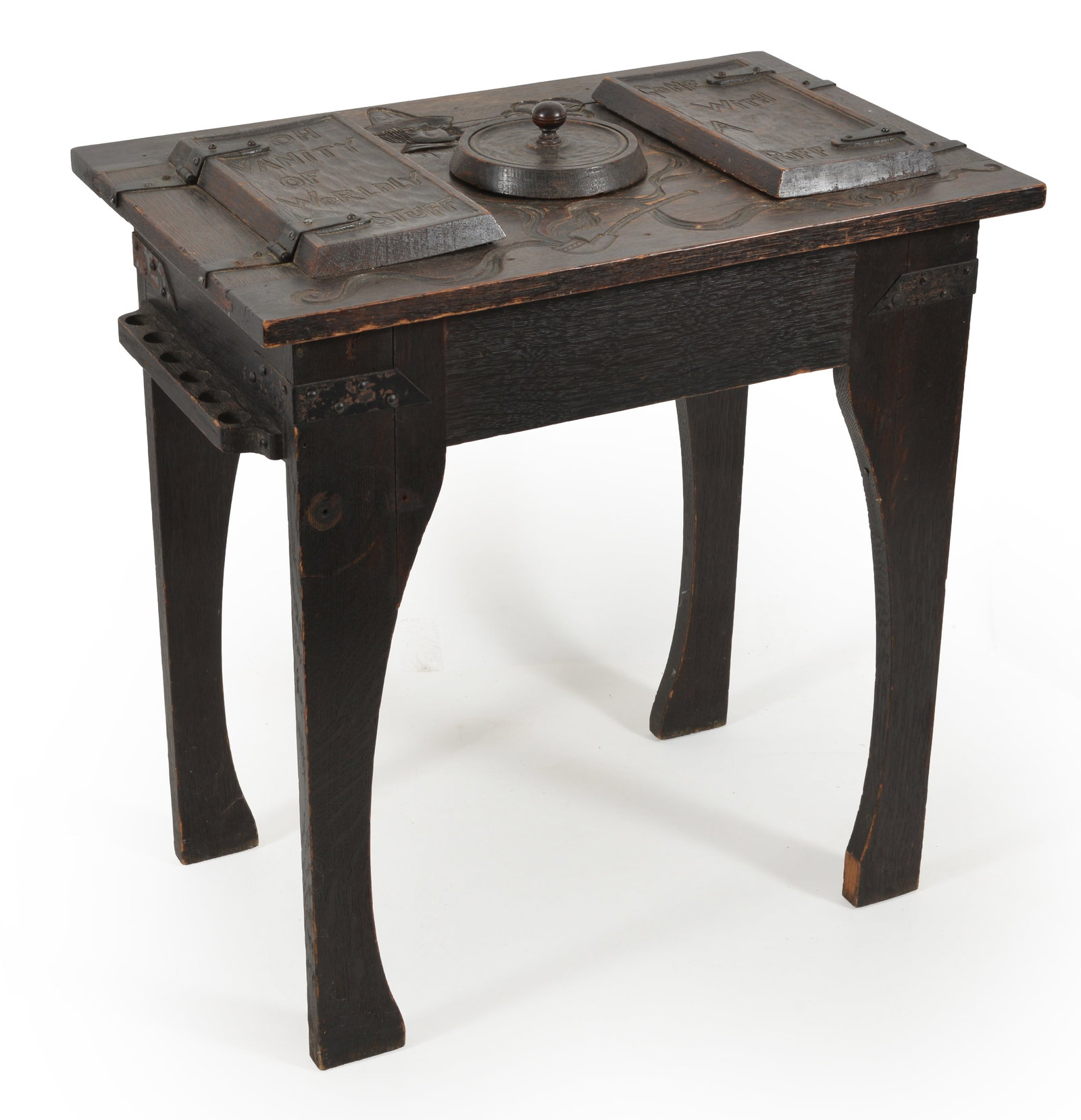Arts and Crafts style carved quartersawn oak smoking stand with pipe compartment lids inscribed "Oh: Arts and Crafts style carved quartersawn oak smoking stand with pipe compartment lids inscribed "Oh Vanity of Worldly Stuff-Gone With a Puff" having portrait of Dutch gentleman and pipe with billowing