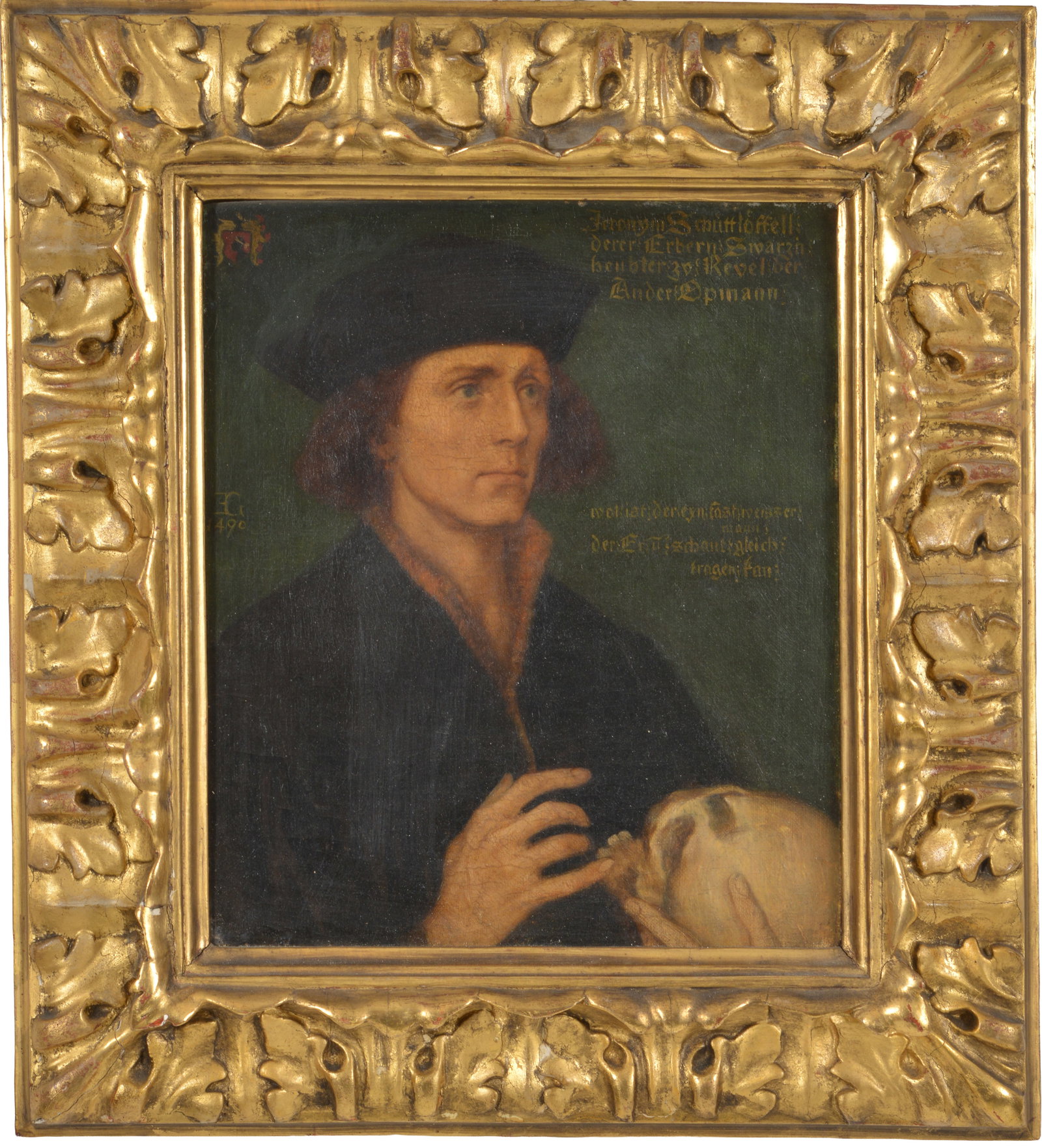 19th Century portrait after northern European 16th Century old master. Portrait of young scholar: 19th Century portrait after northern European 16th Century old master. Portrait of young scholar with black cap holding a skull. German lettering on right and seal and signature and date of 1490 on le