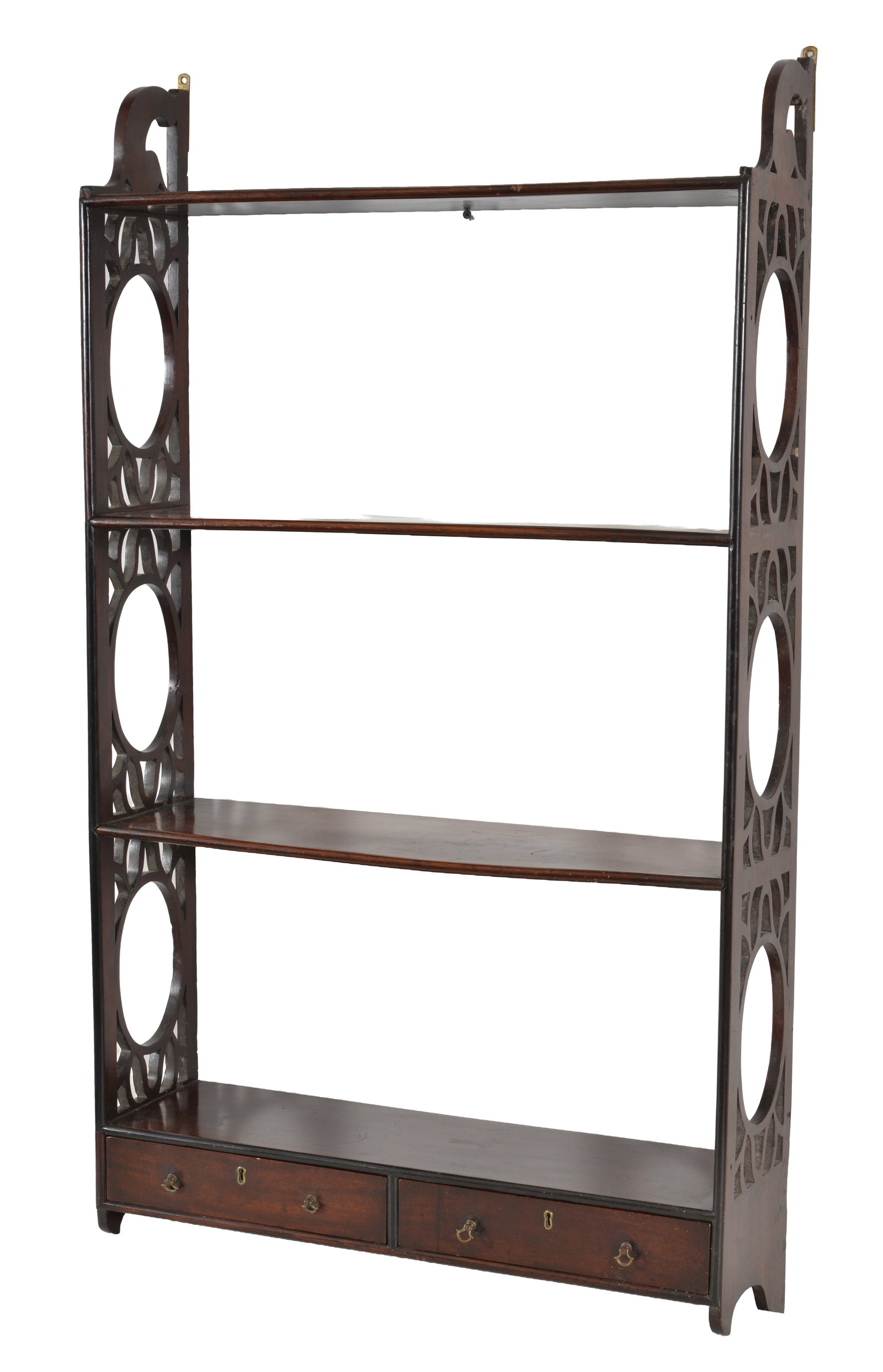 Antique Georgian mahogany wall shelf with pierce decorated sides. 3 shelves and 2 mahogany lined: Antique Georgian mahogany wall shelf with pierce decorated sides. 3 shelves and 2 mahogany lined drawers with original brass pulls. Purchased at Shreves Boston. 45 H x 25 W x 7in D.