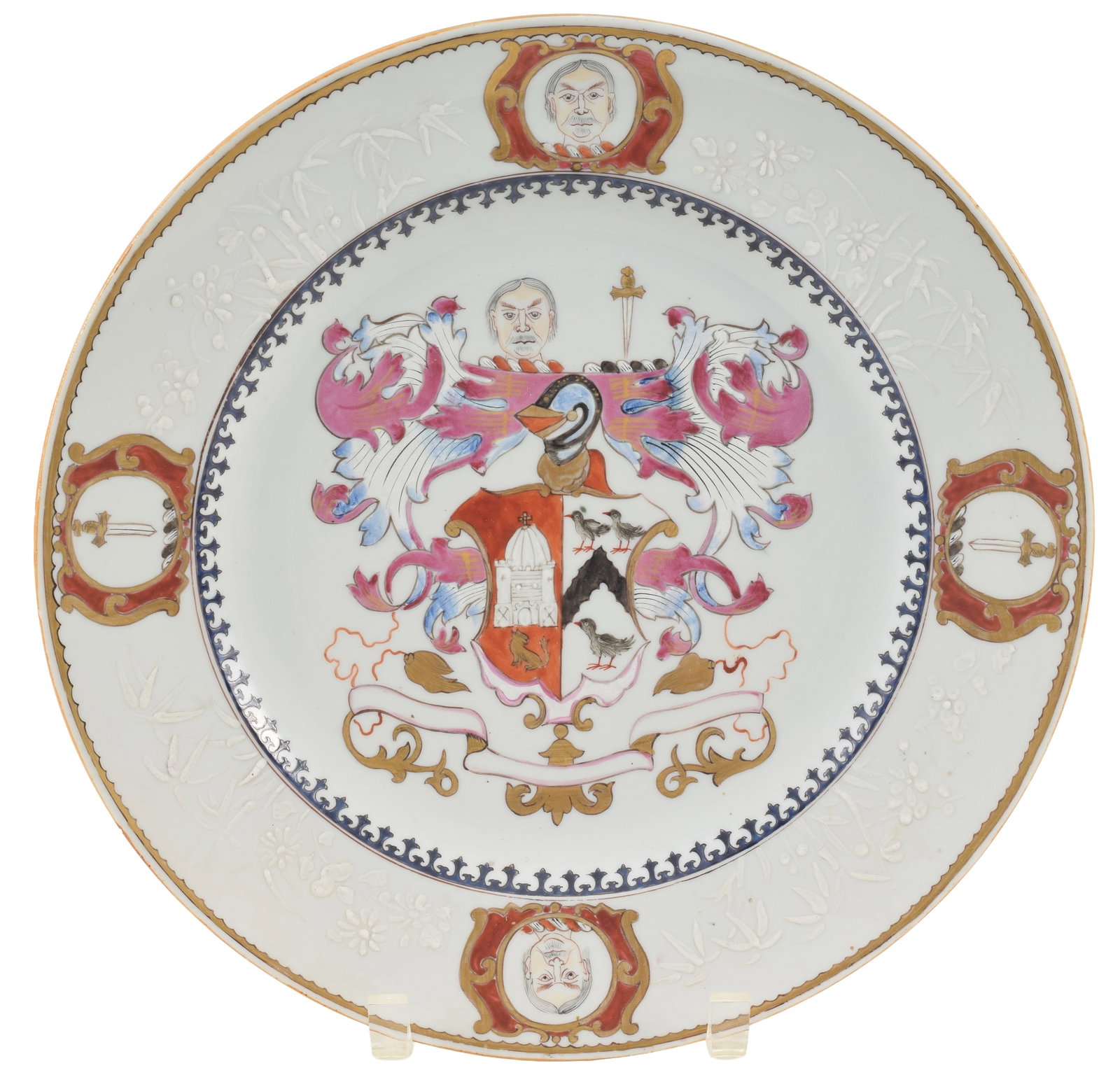 Chinese export style porcelain armorial charger, possibly Samson, 19th century. Large hand painted: Chinese export style porcelain armorial charger, possibly Samson, 19th century. Large hand painted crest in center with smaller vignettes of swords and faces around the edge. Slip decorated floral mot