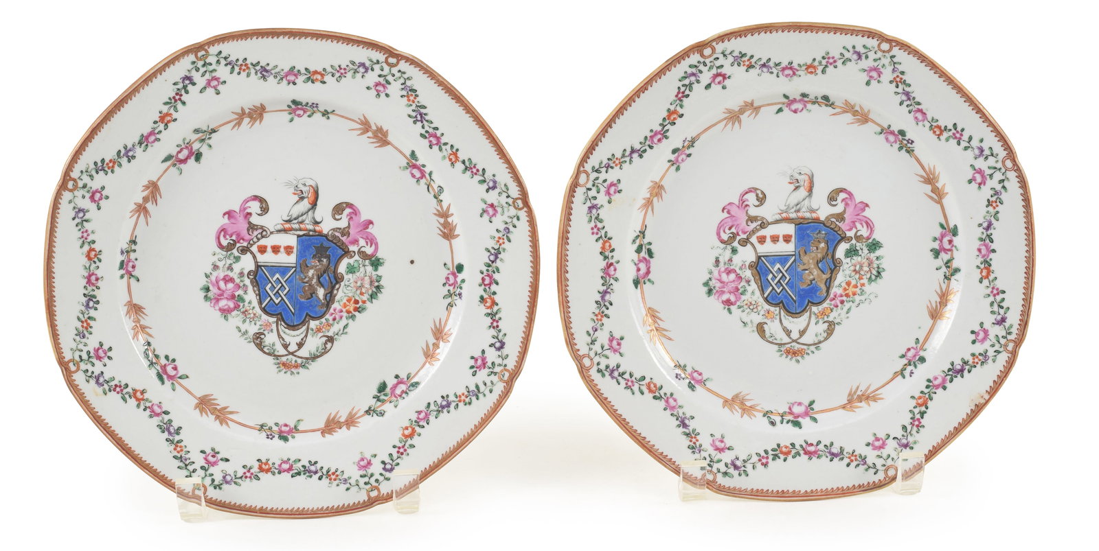 2 18th century Chinese export porcelain armorial decorated plates. Octagonal forms. With the coat of: 2 18th century Chinese export porcelain armorial decorated plates. Octagonal forms. With the coat of arms of Jeaffreson. 9in diameter.
