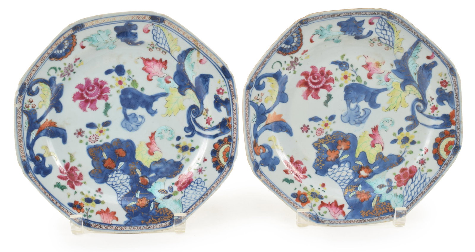 Pair of 18th century Chinese export porcelain tobacco leaf pattern octagonal plates. Rim flakes and: Pair of 18th century Chinese export porcelain tobacco leaf pattern octagonal plates. Rim flakes and chips. Eleanor Gordon label on one of the plates. 8.75in diameter.