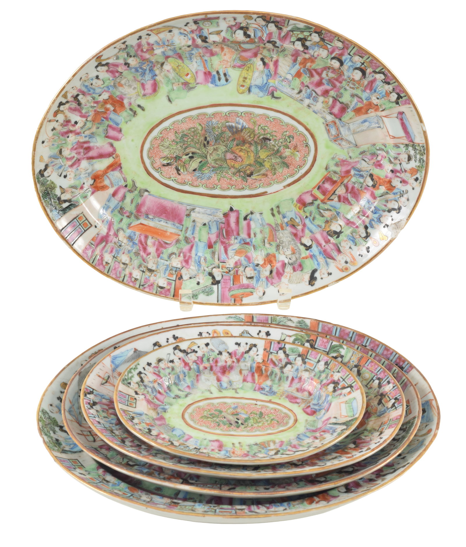Unusual 19th century famille rose Chinese export set of graduated porcelain platters. Decoration of: Unusual 19th century famille rose Chinese export set of graduated porcelain platters. Decoration of numerous figures surrounding a central motif of fruits and butterflies. From direct descendants of J