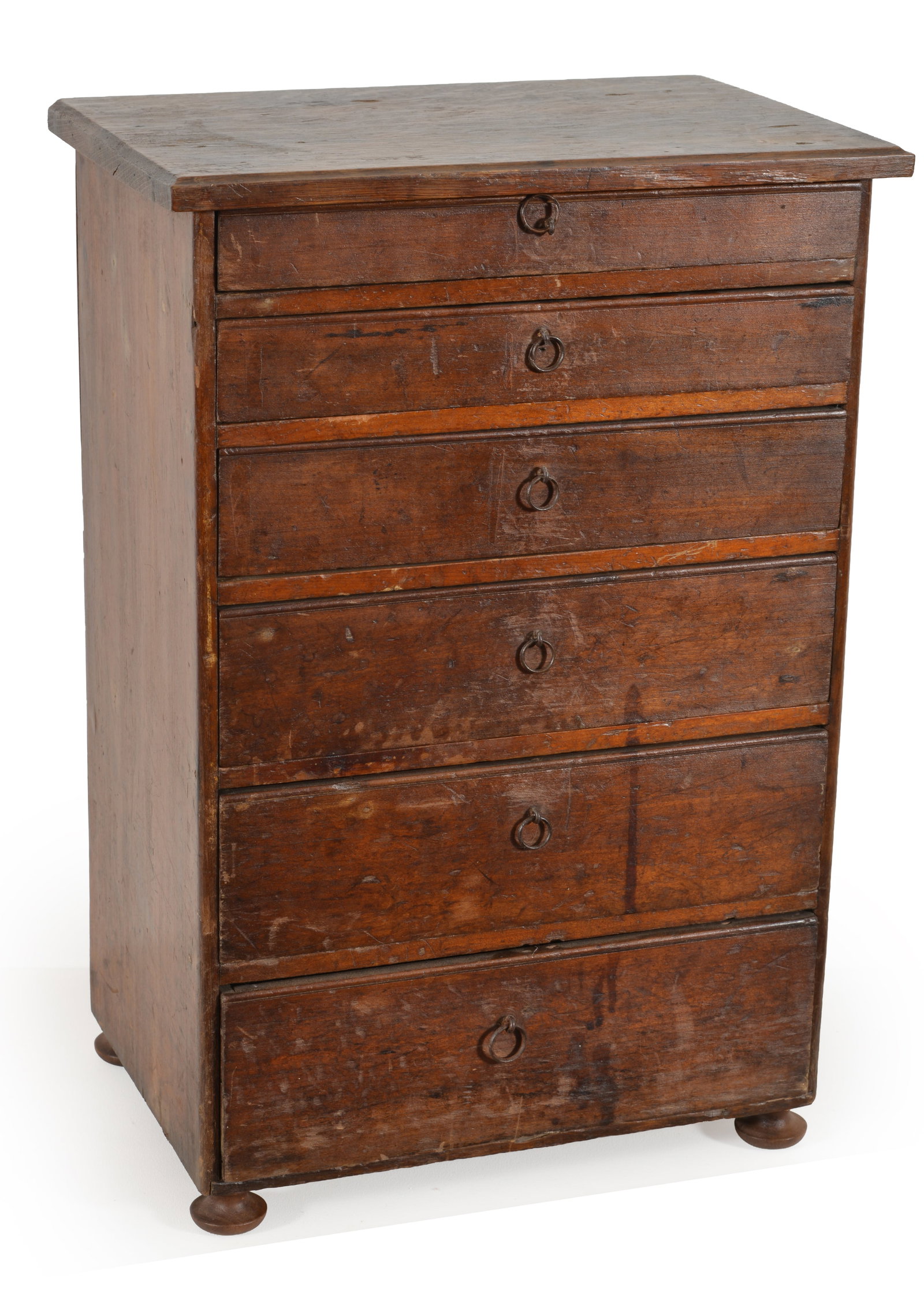 Early 19th century diminutive specimen cabinet with graduated drawers. Bail pulls. Button feet. 20.5: Early 19th century diminutive specimen cabinet with graduated drawers. Bail pulls. Button feet. 20.5 H x 14 W x 9.5in D.