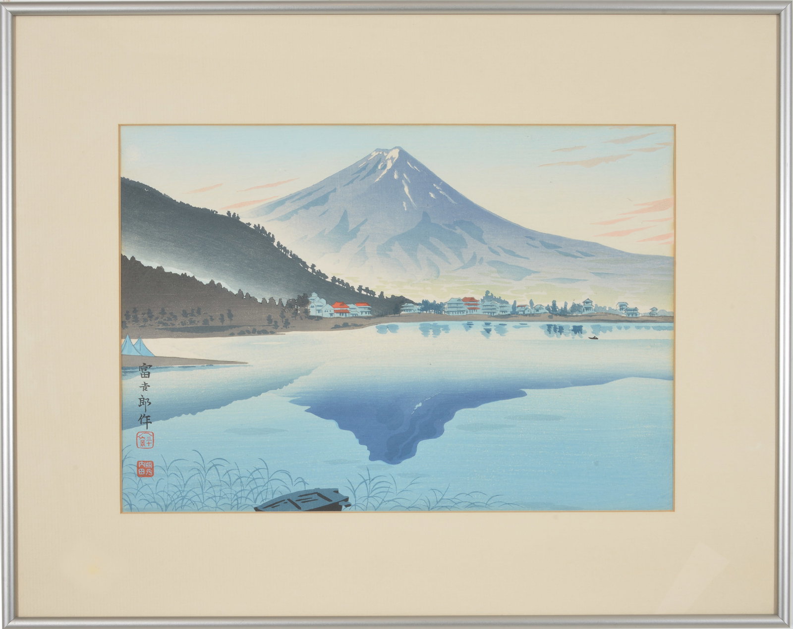 Tomikichiro Tokuriki. "Fuji Reflected in Lake Kawaguchi". Japanese color woodblock print. Framed: Tomikichiro Tokuriki. "Fuji Reflected in Lake Kawaguchi". Japanese color woodblock print. Framed under glass. Label on reverse. Sight: 10.25 x 14.75in. Overall: 16.5 x 21in.