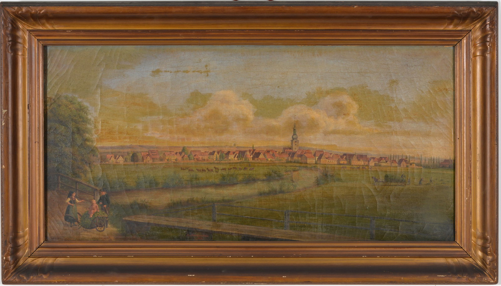Josef Hermannstorfer. Germany. 1868 Bavarian townscape with farmers harvesting hay in the: Josef Hermannstorfer. Germany. 1868 Bavarian townscape with farmers harvesting hay in the foreground. Oil on canvas. Signed and dated lower center. Framed. Craquelure. Repaired line in sky. Sight: 16 