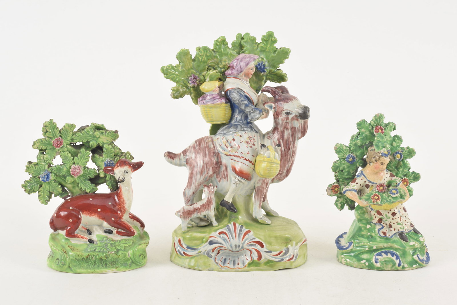 3 Staffordshire landscape figures, 19th Century, including a woman riding a goat, a girl with basket (1 of 8)