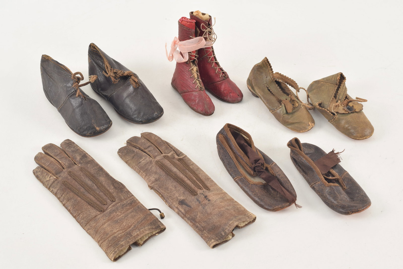 Collection of 19th Century child's and dolls shoes and gloves. (1 of 8)
