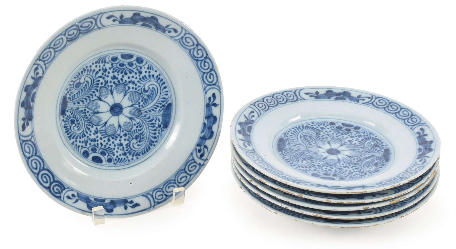 Set of 6 Delft tin glaze plates with floral centers and decorated borders. Typical rim frits.: Set of 6 Delft tin glaze plates with floral centers and decorated borders. Typical rim frits. Diameter 9 in.