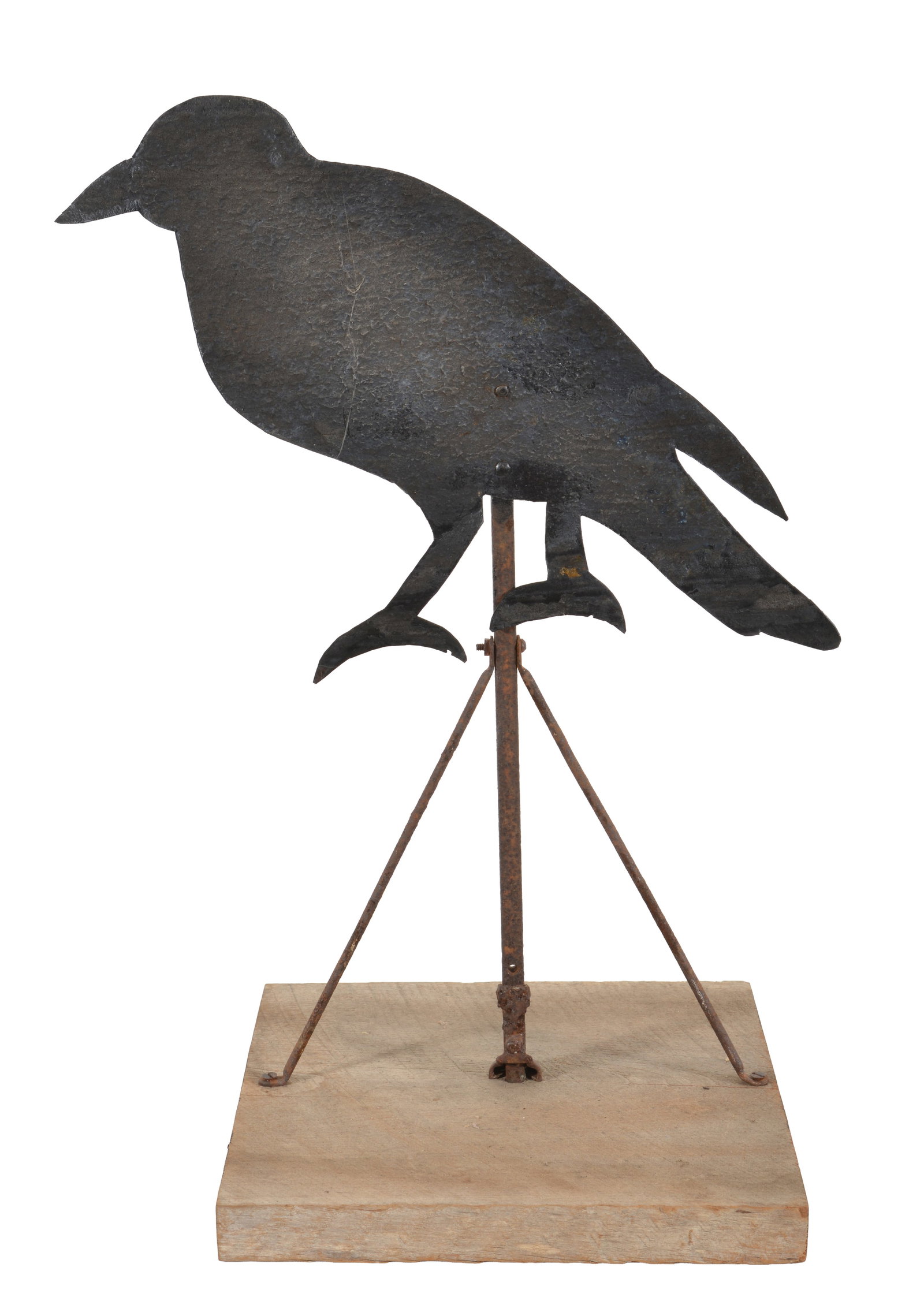 Cut steel folk art crow silhouette on iron stand with wooden base, late 19th Century. Height 25 in,: Cut steel folk art crow silhouette on iron stand with wooden base, late 19th Century. Height 25 in, 18 in.