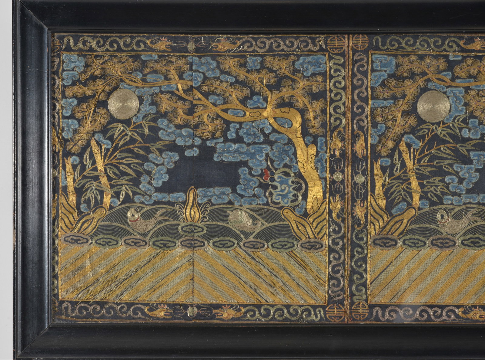 Pair of Chinese silk and gold thread embroidered rank badges, 19th century. Framed together under - 2