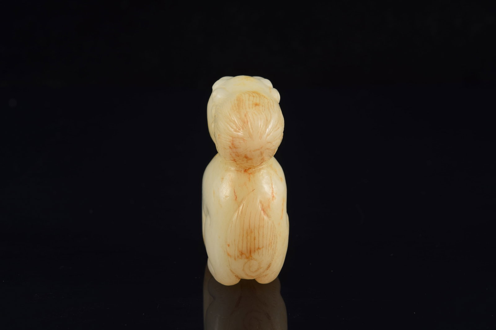 Jade carving of a buddhist lion. China. 19th century or earlier. Stone of a white color with russet - 4