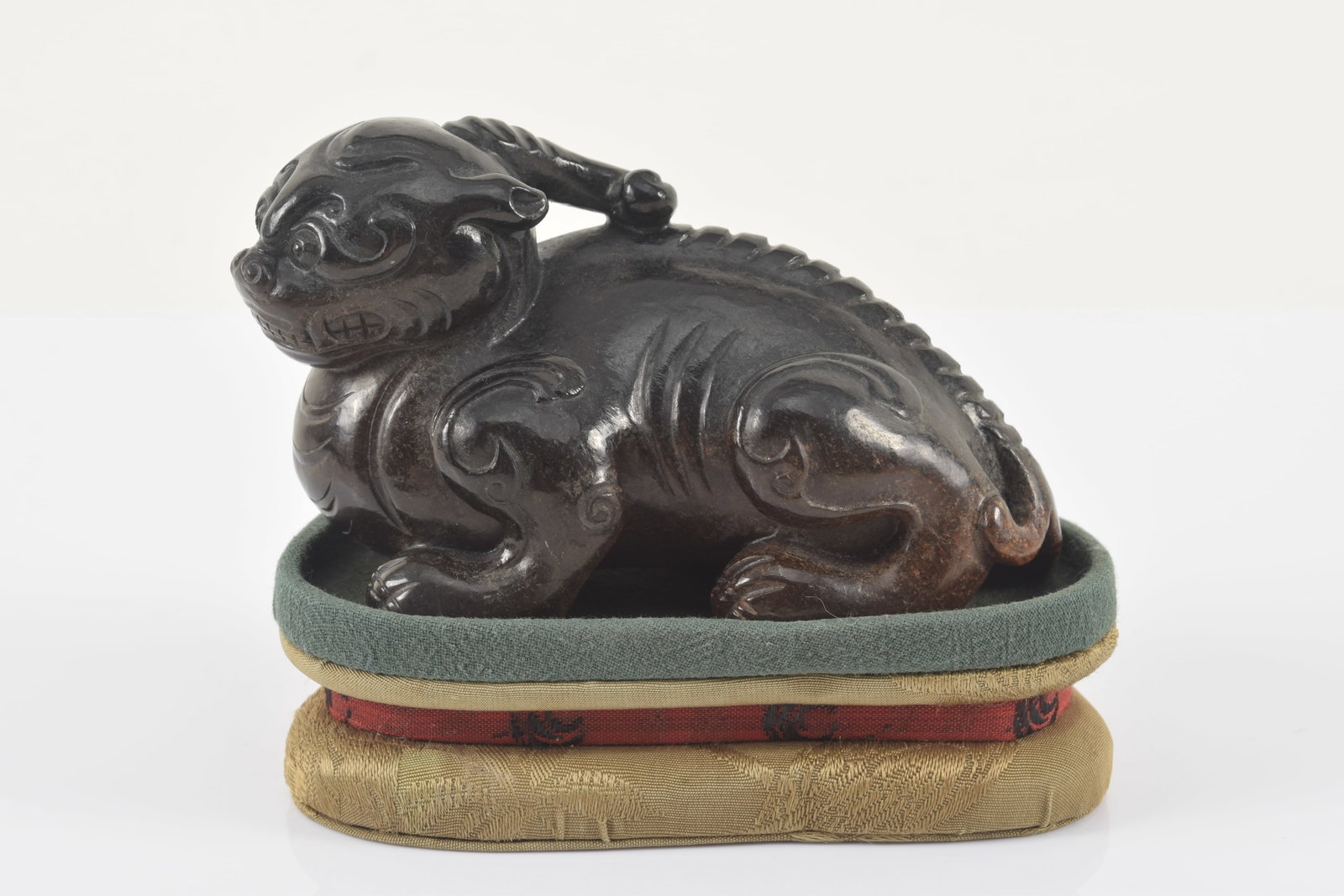 Jade luodan. China. Ming period (1368-1644). Fitted cloth stand. 4.25 x 2.5in of luodan. - 2